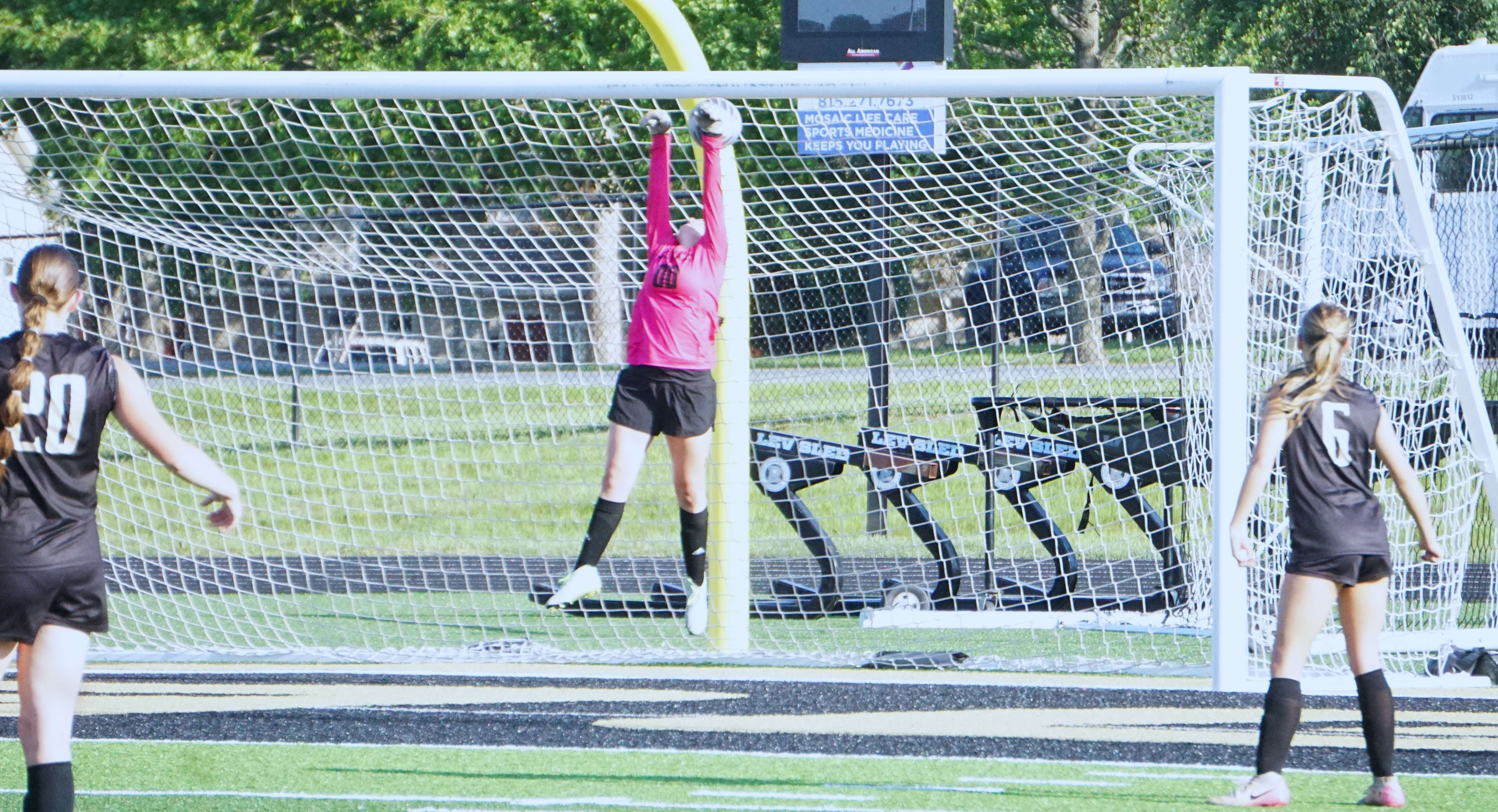 Savannah goalkeeper Schyler Hall misses a goal shot from Maryville's Payton Kurz/ Photo by Matt Pike