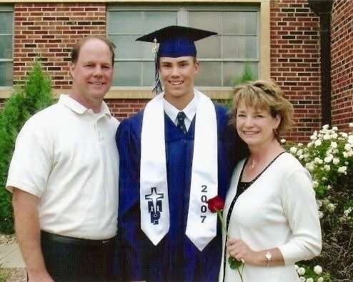 The Rev. Andy Hammeke with his parents after graduating from Thomas More Prep-Marian High School in 2007. Courtesy photo