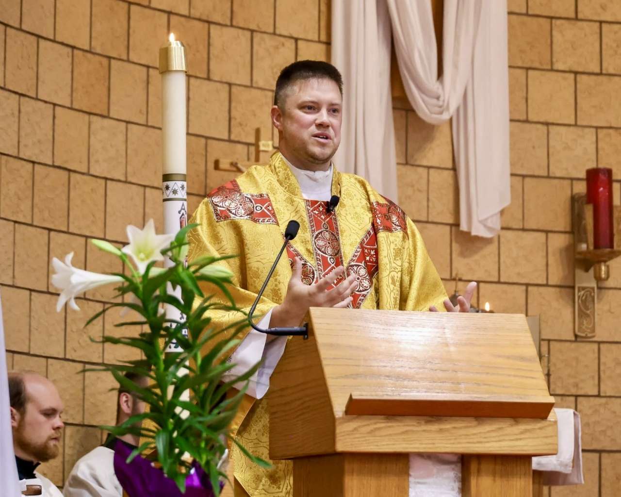 The Rev. Andy Hammeke speaking at the 2025 Easter Vigil Mass in the Comeau Catholic Campus Center chapel. Courtesy photo