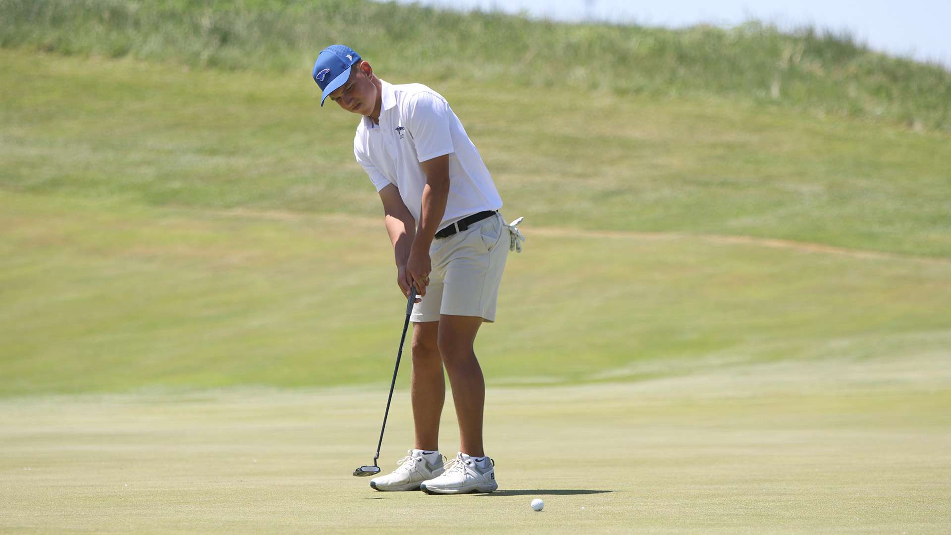 Grant Hatzenbuehler cards a 1-under 71 to lead the Blue Dragon men's golf team on Day 2 of the NJCAA Division I Championships on Wednesday at Sand Creek Station in Newton (Billy Watson/Blue Dragon Sports Information)