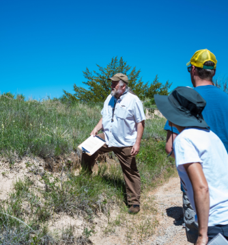 Steven Rolfsmeier gives a Wildflower Walk at Scotts Bluff National Monument in 2018. NPS Photo
