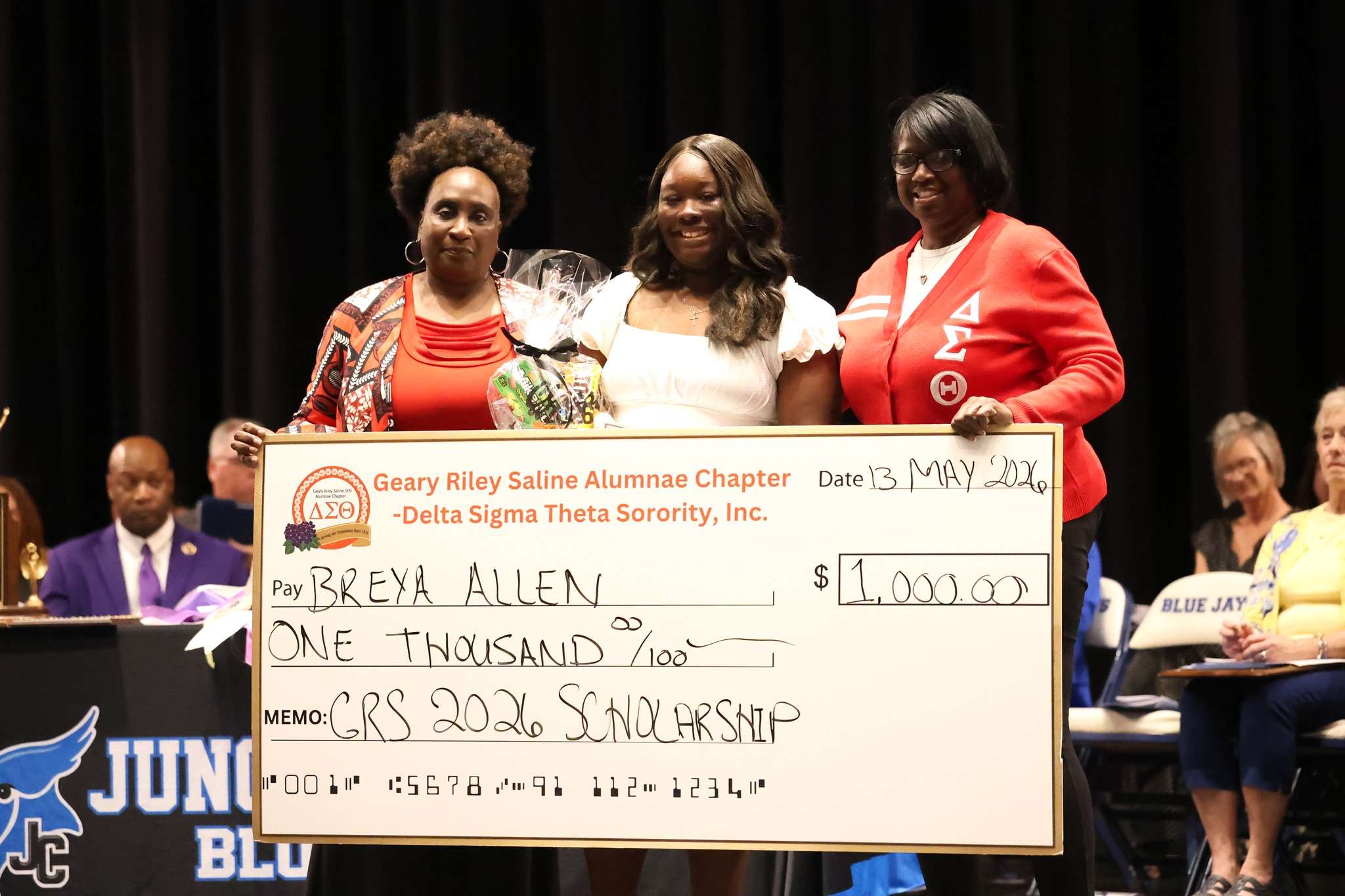 Breya Allen presented with a $1,000 scholarship