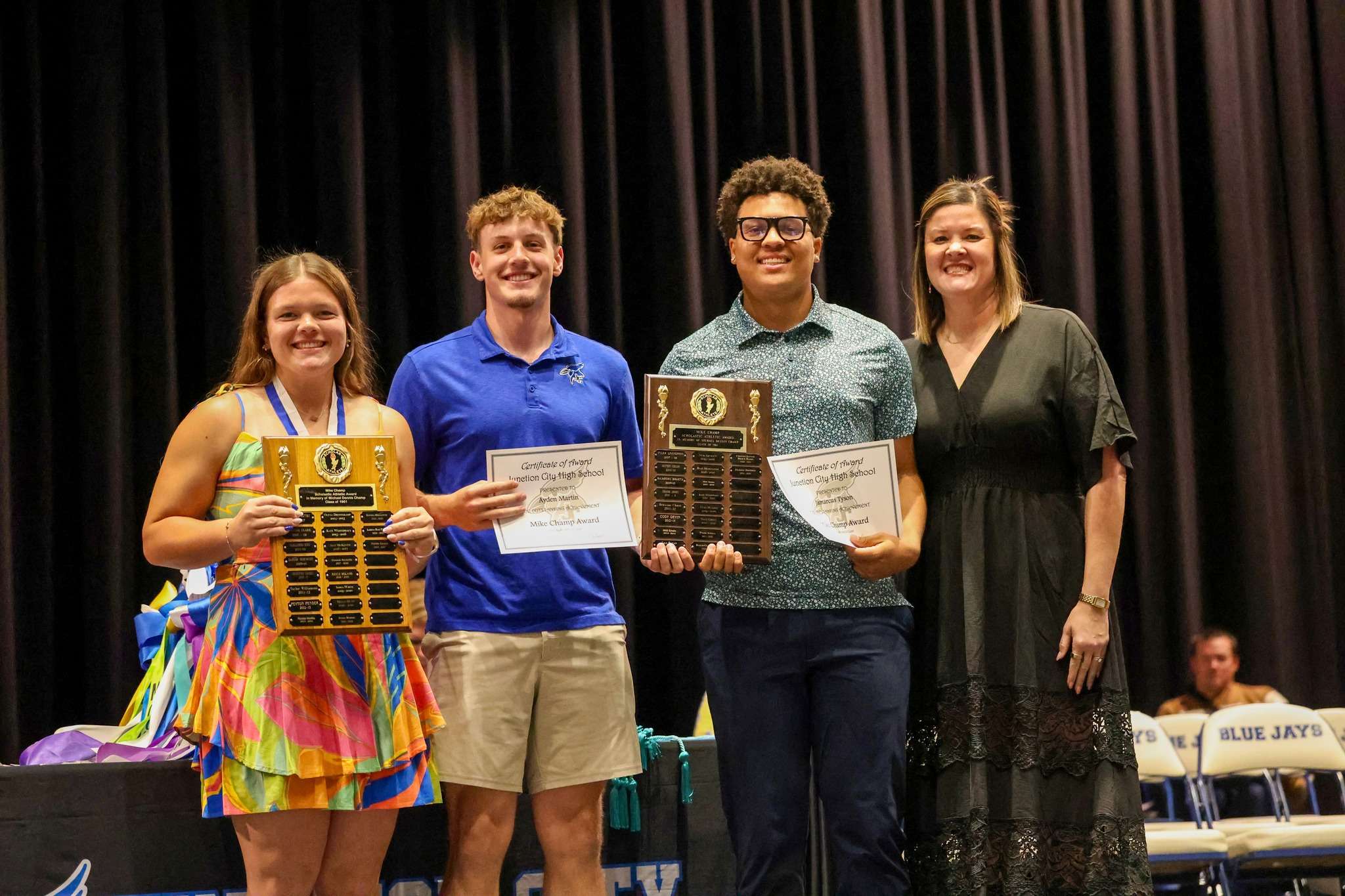 (Pictured left to right) - Morgan Nabus, Ayden Martin, Jamarcus Tyson, and JCHS Principal GG Booth.
