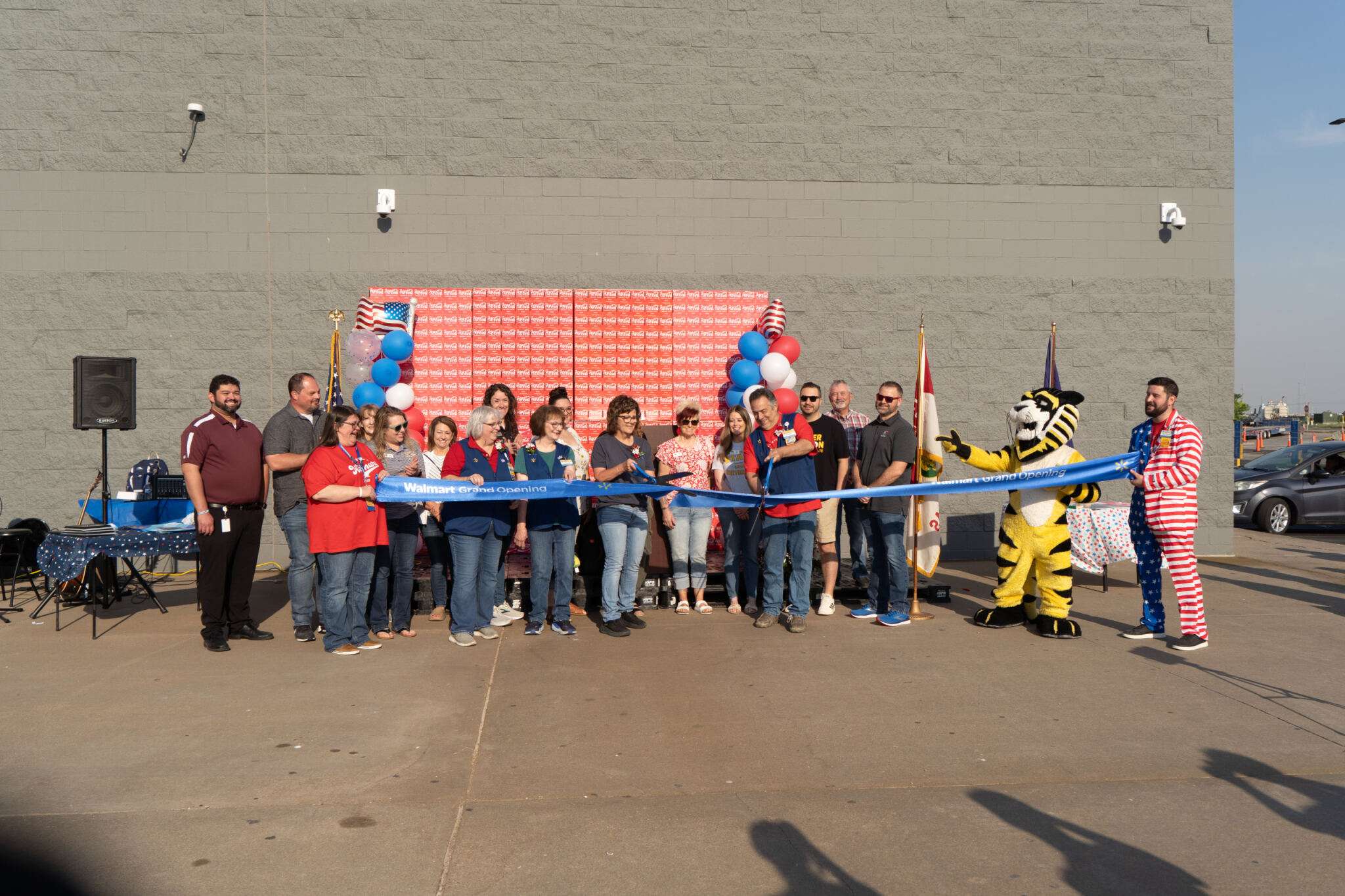 Hays Walmart and local representatives celebrating their grand-reopening with a ribbon cutting ceremony. Photo by Leigh Purdy/Chamber in Hays
