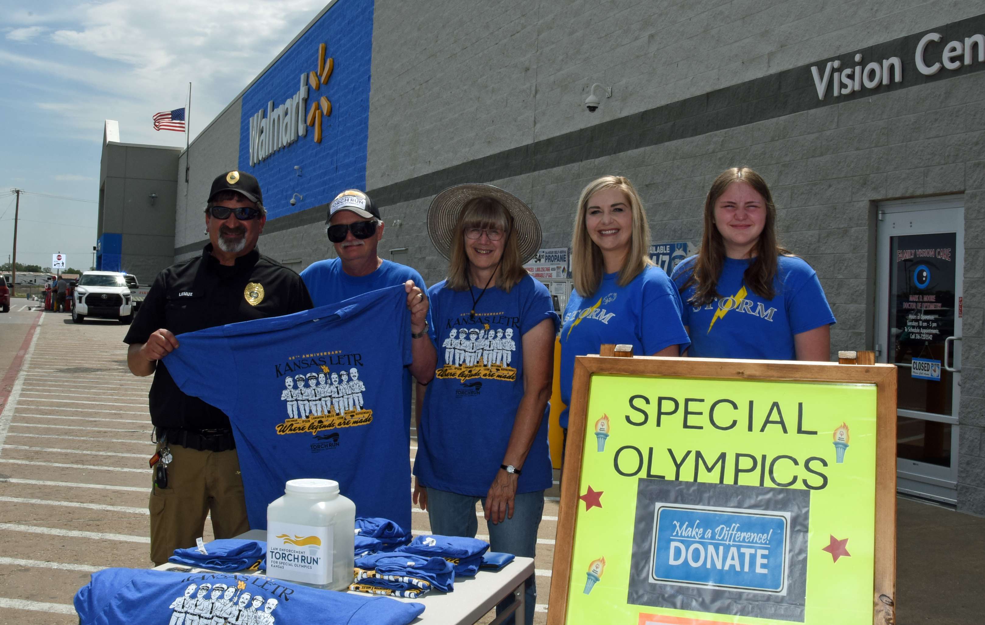 Covering the west entrance of Walmart, Great Bend, on Friday for LETR T-Shirt and coin sales and taking of donations is (left to right) Anthony Lemuz (LSCF), Steve Smolik (Storm athlete), Penny Riedel (LSCF), Amanda Hammond (Storm Team local program coordinator), and Laurel Fellers (Storm volunteer).