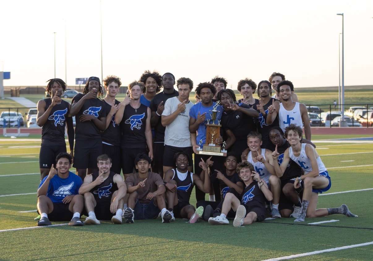 Junction City High School Boys Track Team - Holding the Centennial League Trophy.