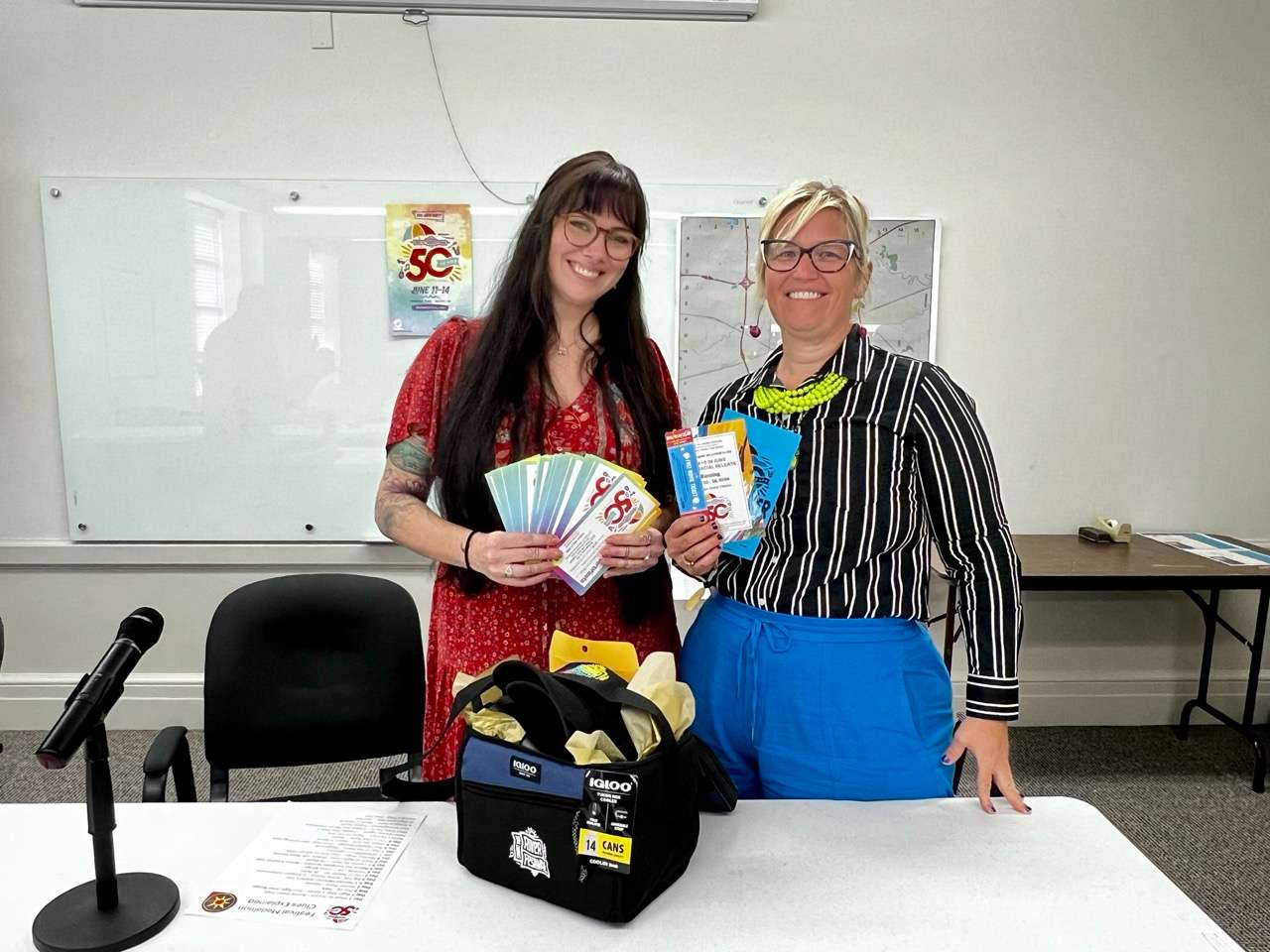 Courtney Witten (left), winner of 2026 Smoky Hill River Festival Medallion Quest and Crystal Hammerschmidt of Salina Arts &amp; Humanities - Photo, Nicolas Fierro