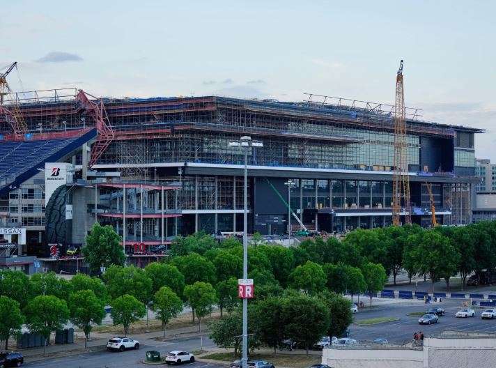 Construction continues on a new enclosed stadium for the Tennessee Titans NFL football team Monday, May 18, 2026, in Nashville, Tenn. (AP Photo/George Walker IV, File)