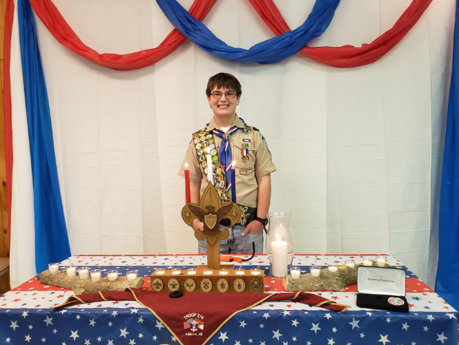Alliance High School junior, Dracen Buschow, received an Eagle Scout badge of honor following a ceremony on Saturday, May 16, 2026 at VFW Post 1517 in Alliance.