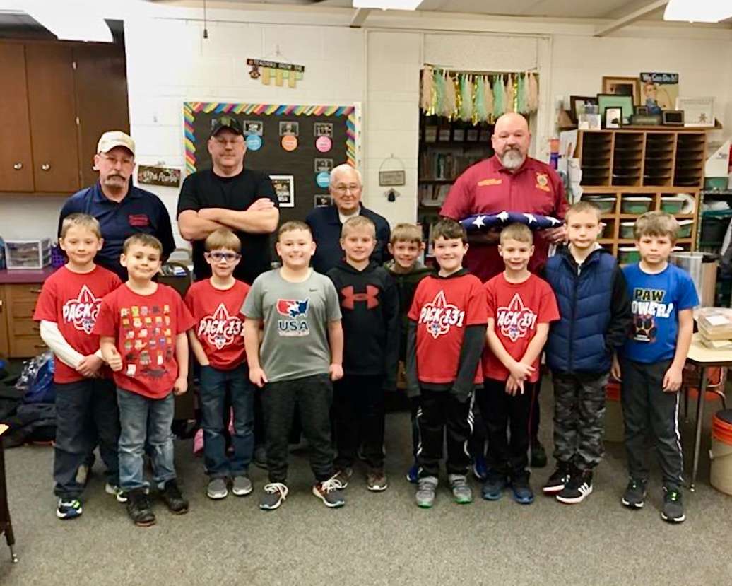 American Legion members with the Hays Cub Scouts for a flag folding class. Courtesy photo