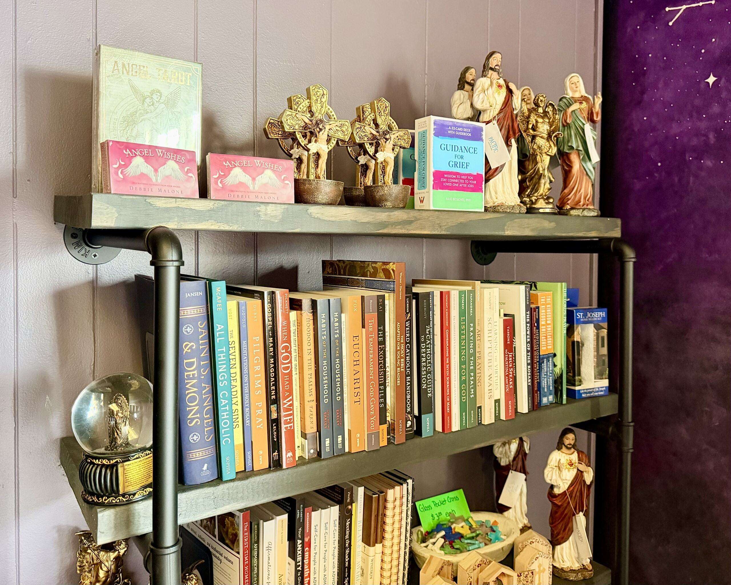 Books and religious items from Alternative Reflection in Hays. Photo by Tony Guerrero/Hays Post