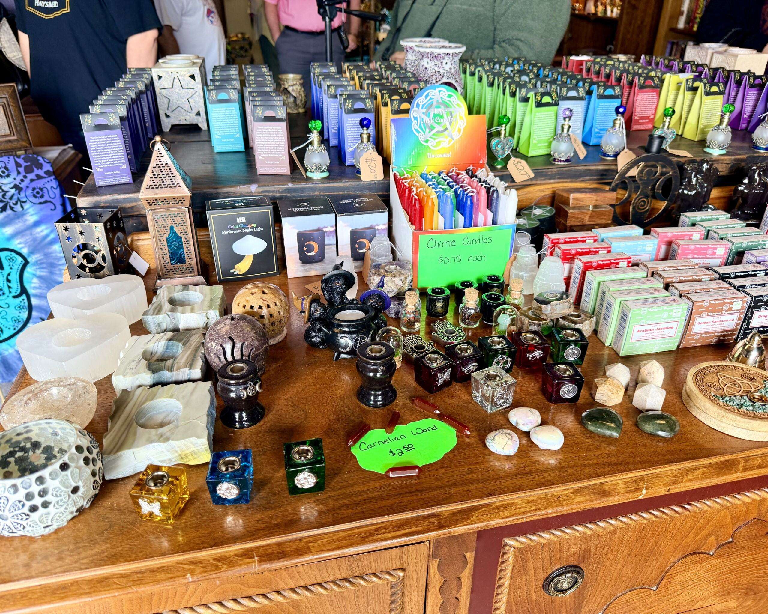 Candles, stones and other items on display at Alternative Reflection in Hays. Photo by Tony Guerrero/Hays Post