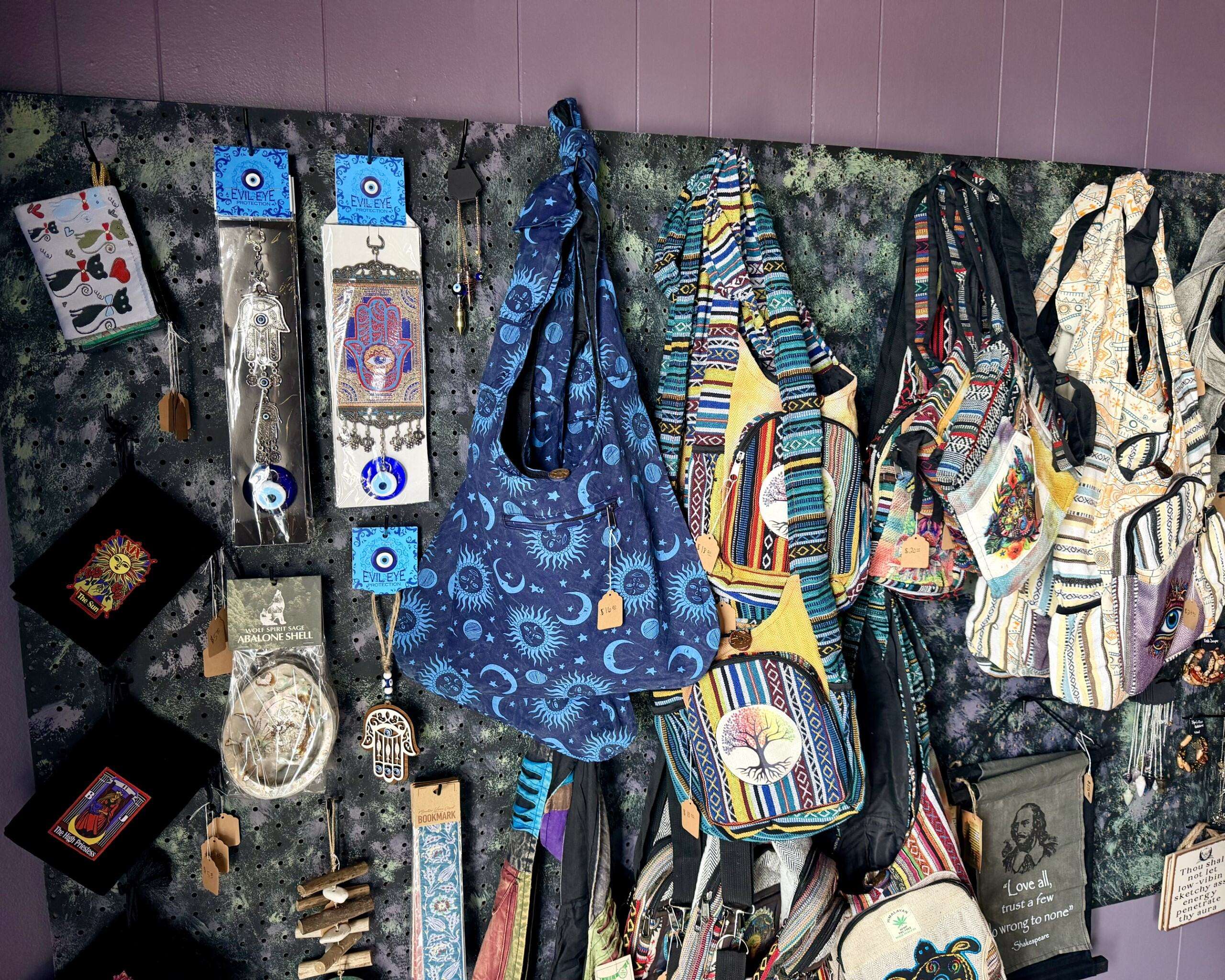 A wall full of bags and spiritual items near the front entrance Alternative Reflection. Photo by Tony Guerrero/Hays Post