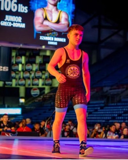 Xzander Donner walking to the mat during showcasing his Greco-Roman style form of wrestling. Photo submitted