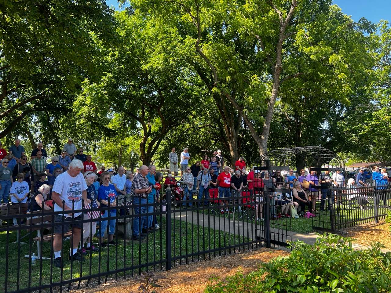 Large crowd gathers to celebrate, honor and remember the lives of all U.S. Military servicemen and women who sacrificed their lives during the Memorial Day Service at Sunset Park in Salina, KS on May 25, 2026 - Photo, Nicolas Fierro