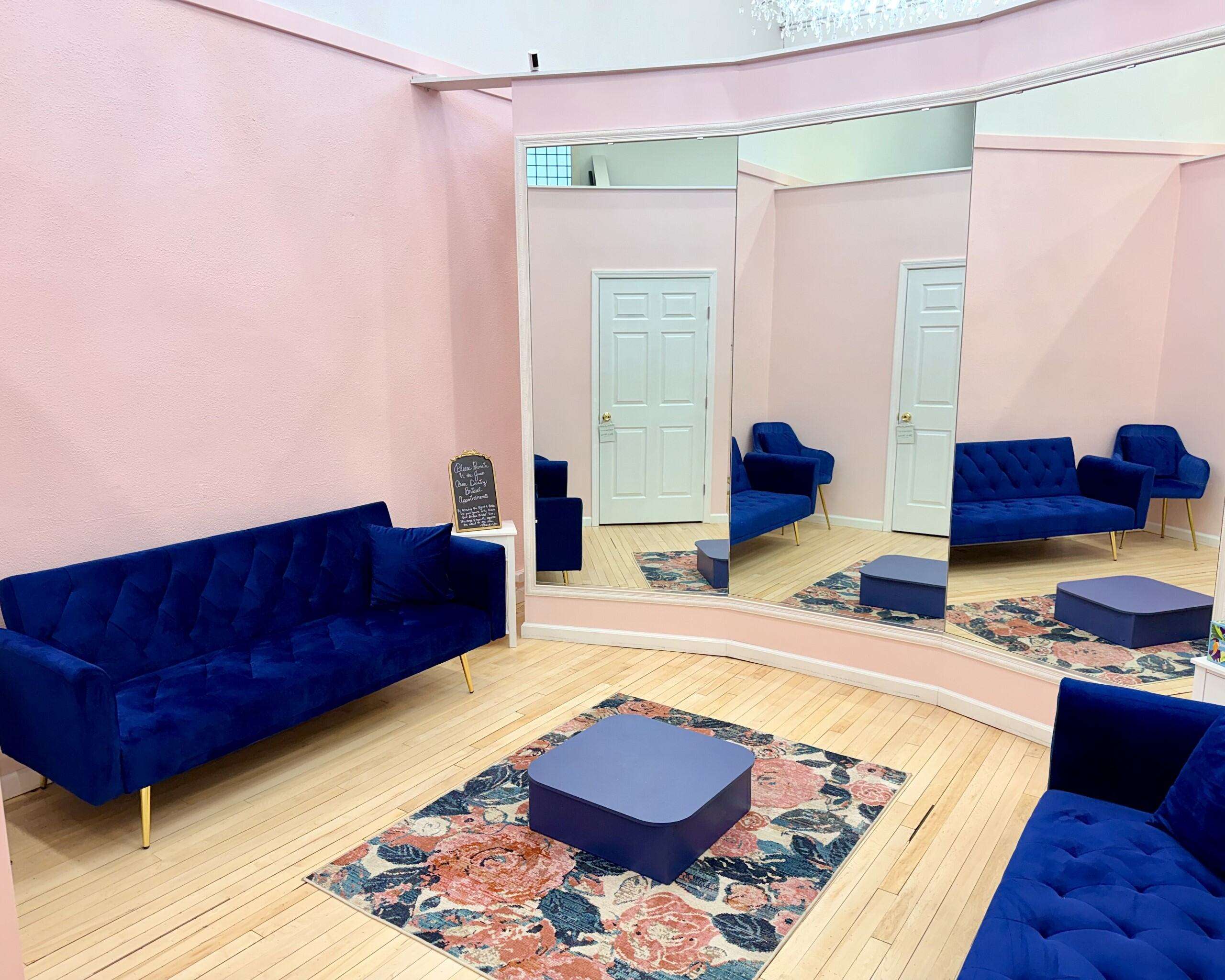 A bridal suite with a three-angled mirror, couch and small table. Photo by Tony Guerrero/Hays Post