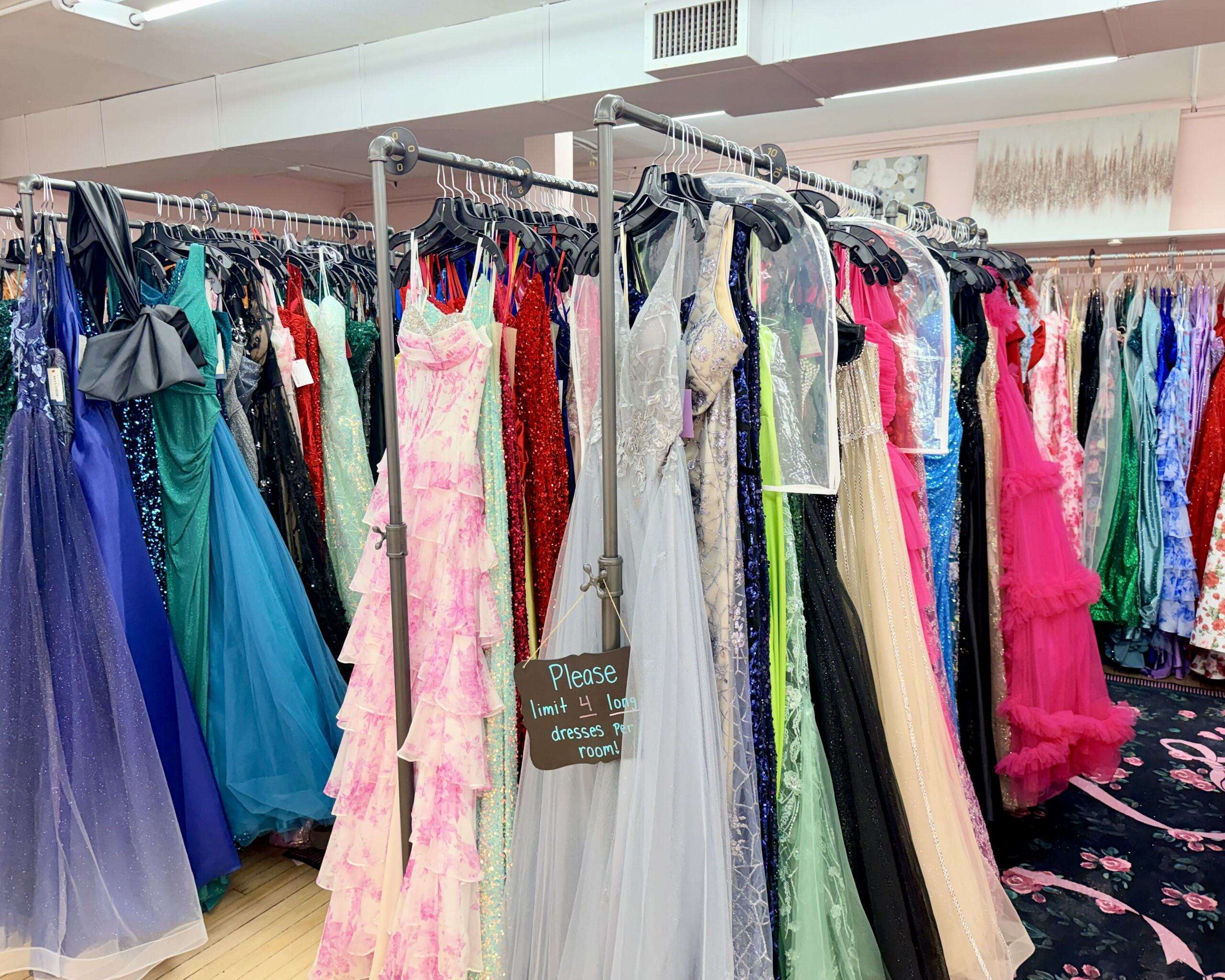 Racks of prom and homecoming dresses located towards the back of Something Blue. Photo by Tony Guerrero/Hays Post
