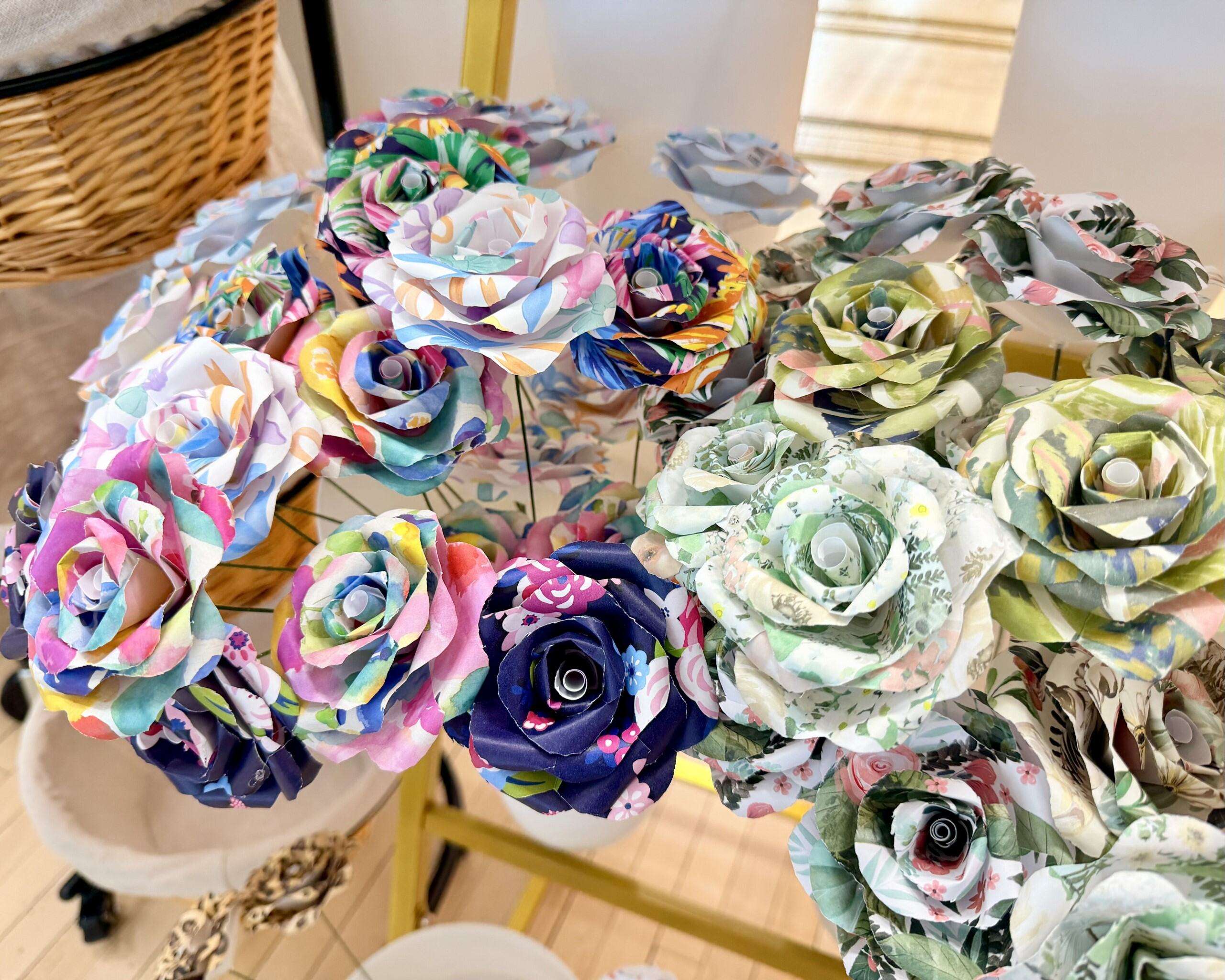Kayla Rathbun, owner of Something Blue, said she sold hundred of thousands of paper roses on Etsy before expanding her businesses to include wedding rentals, which she no longer offers. Photo by Tony Guerrero/Hays Post