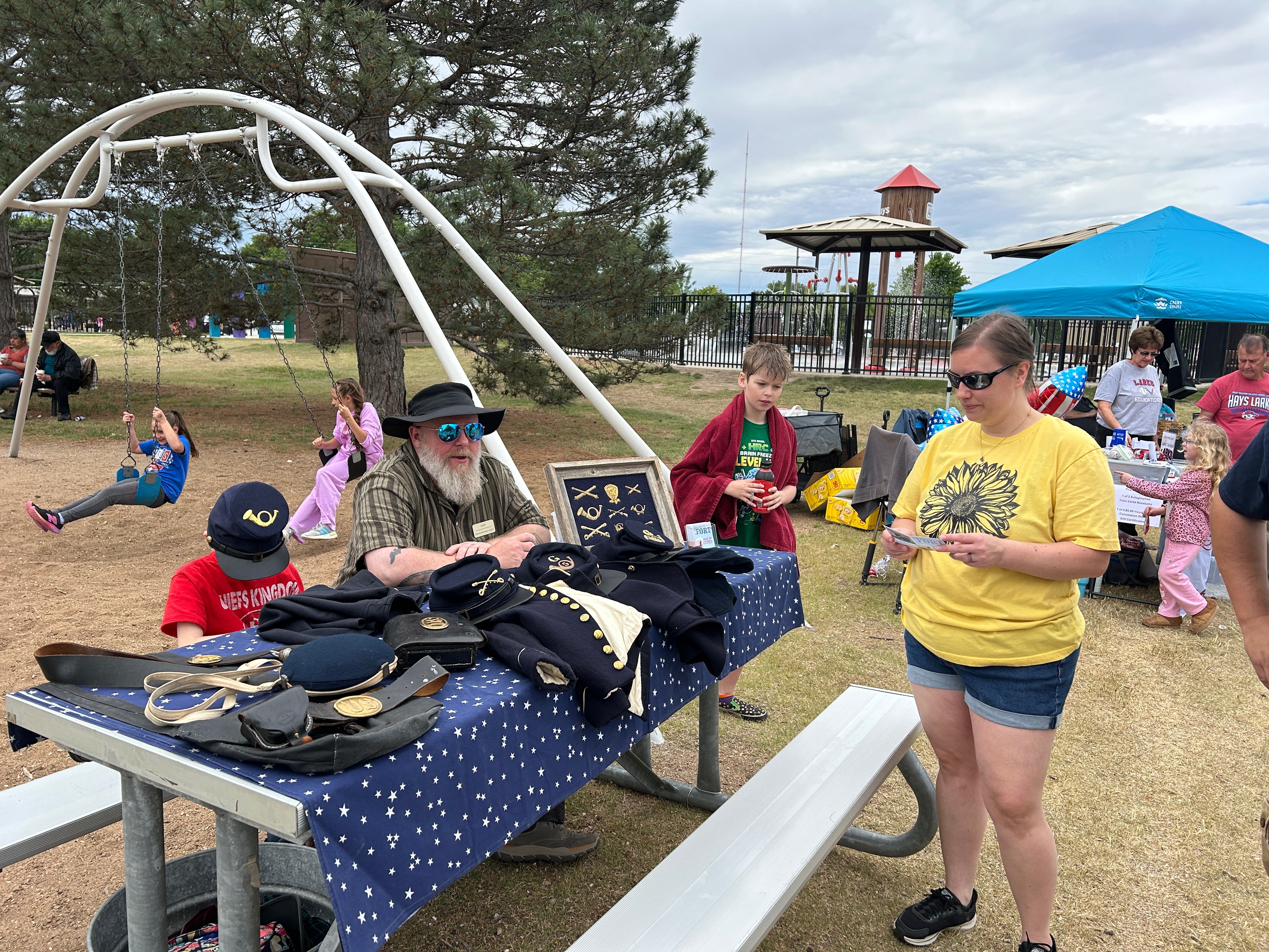 Fort Hays Historic Site and the Kansas Historical Society show off authentic Civil War memorabilia including Blue Union uniforms and canteens. Photo Courtesy of Hays CVB. <br>