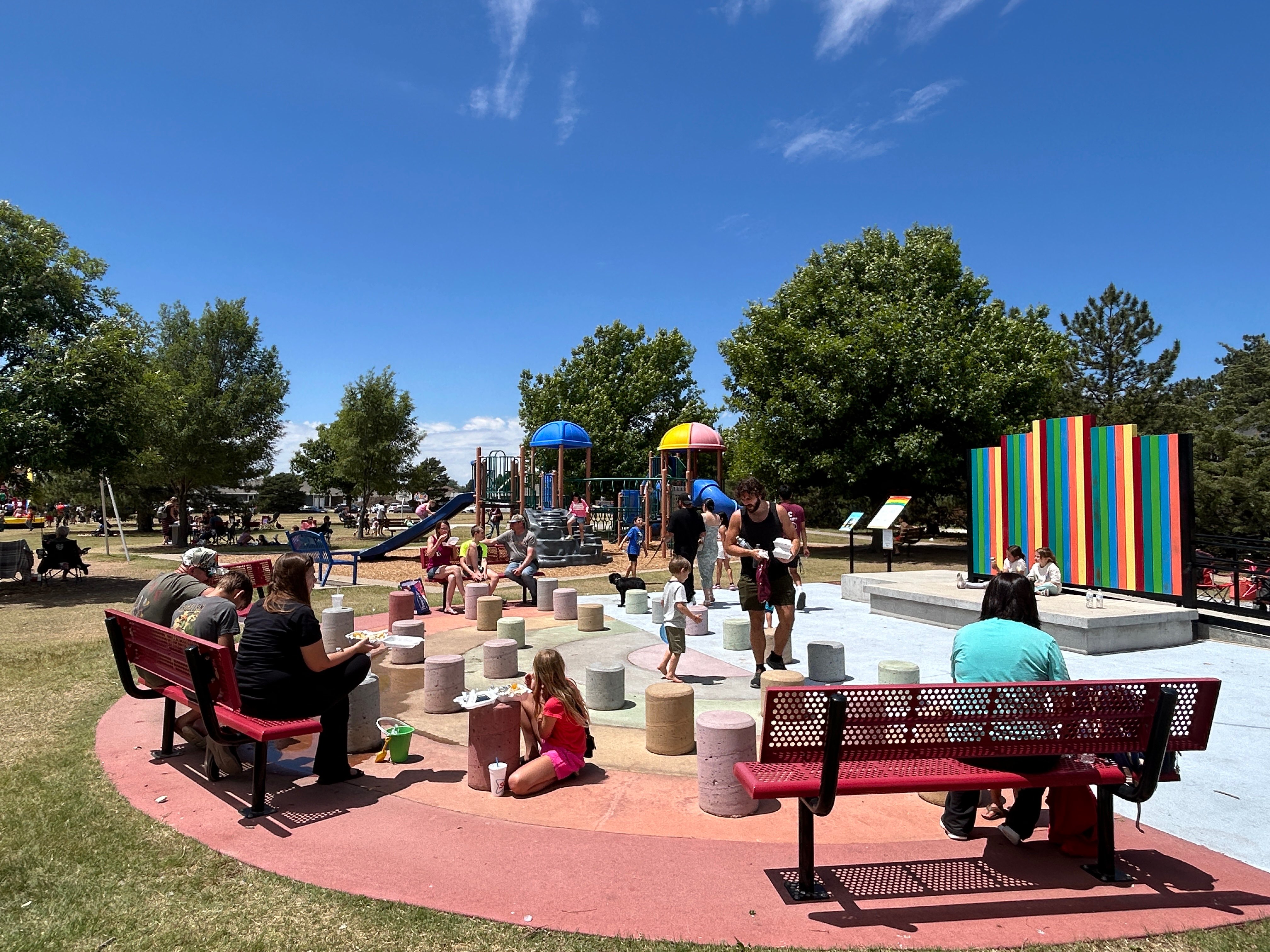 Families relax and eat at the beautiful rainbow pavilion. Photo courtesy of Hays CVB. 