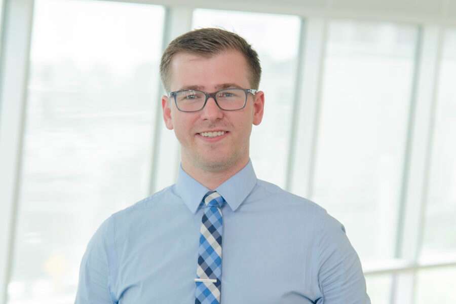 Dalton Nelsen, a Chadron State College alum, was awarded the Spirit of Community Service Award at the University of Nebraska Medical Center (UNMC) Faculty Senate annual meeting in April 2026. The award recognizes faculty members who have used expertise, resources, talent and time outside their UNMC duties to provide community service. (Photo by UNMC, used with permission)