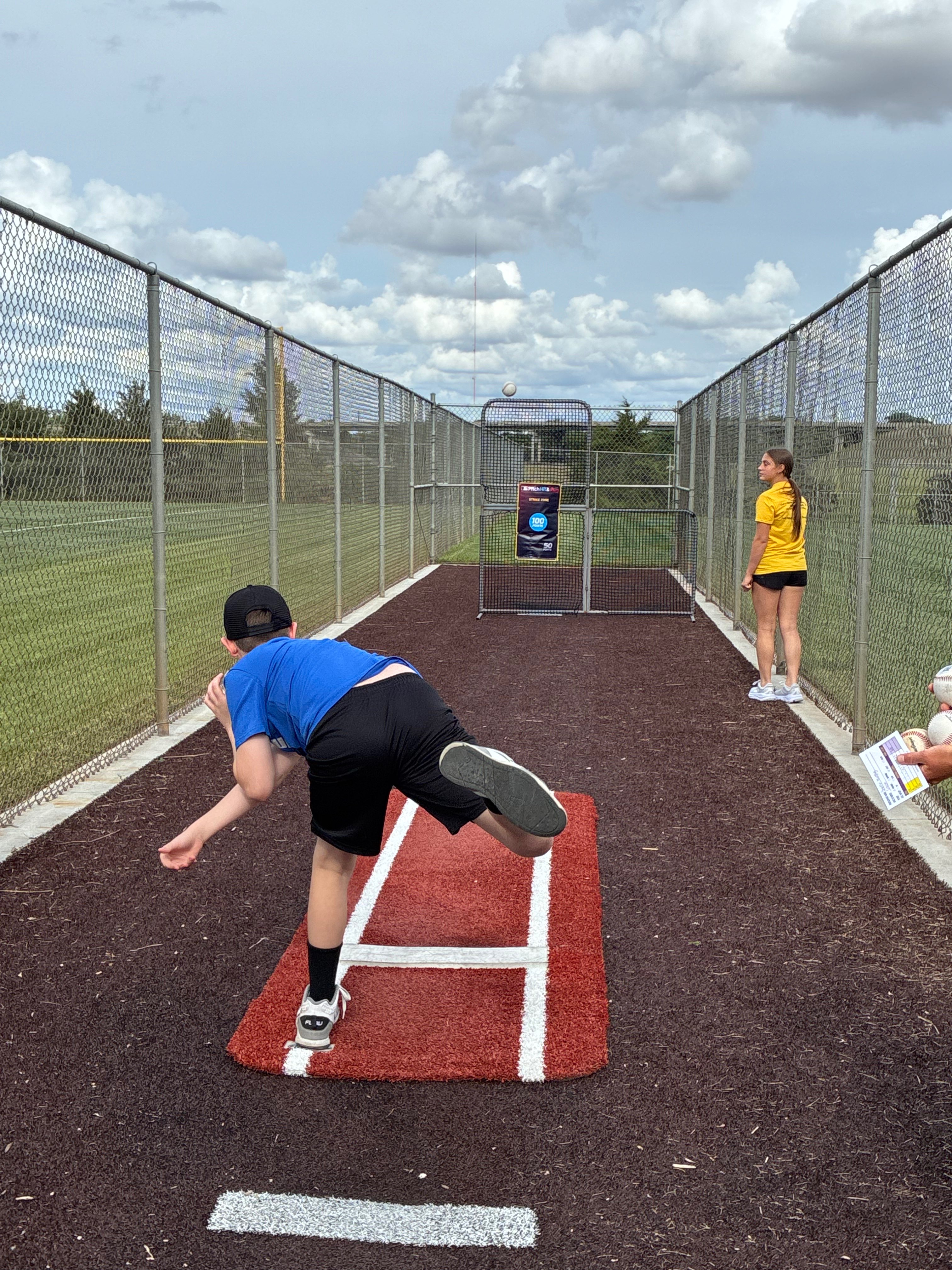 Pitching contest at Hays Rec Opening Day. Photo by Alin Hett/Hays Post. 