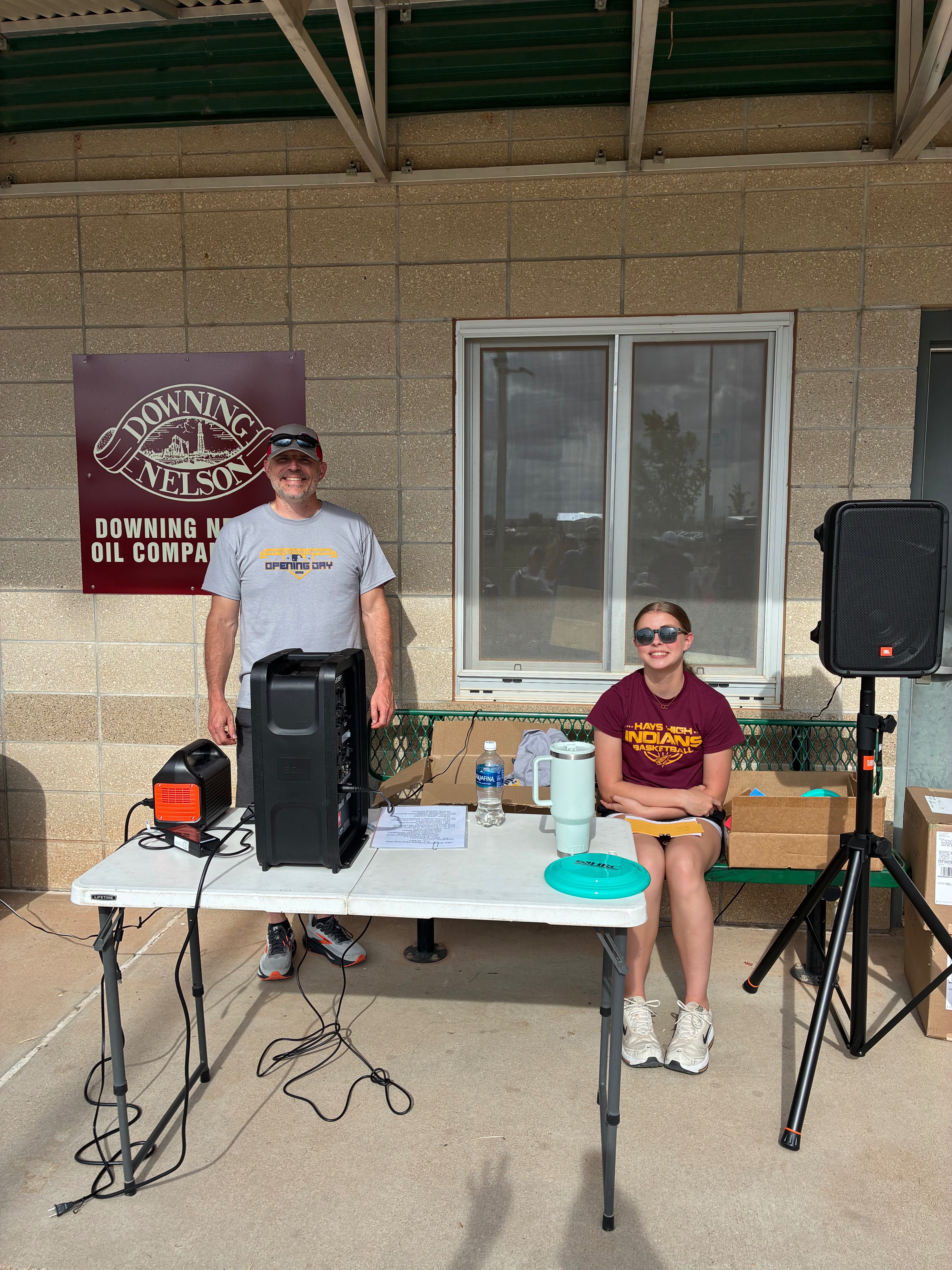 Hays Recreation Board Member Dustin Armbruster and his daughter Paityn Armbruster being the MC's for opening day. Photo by Alin Hett/Hays Post. 