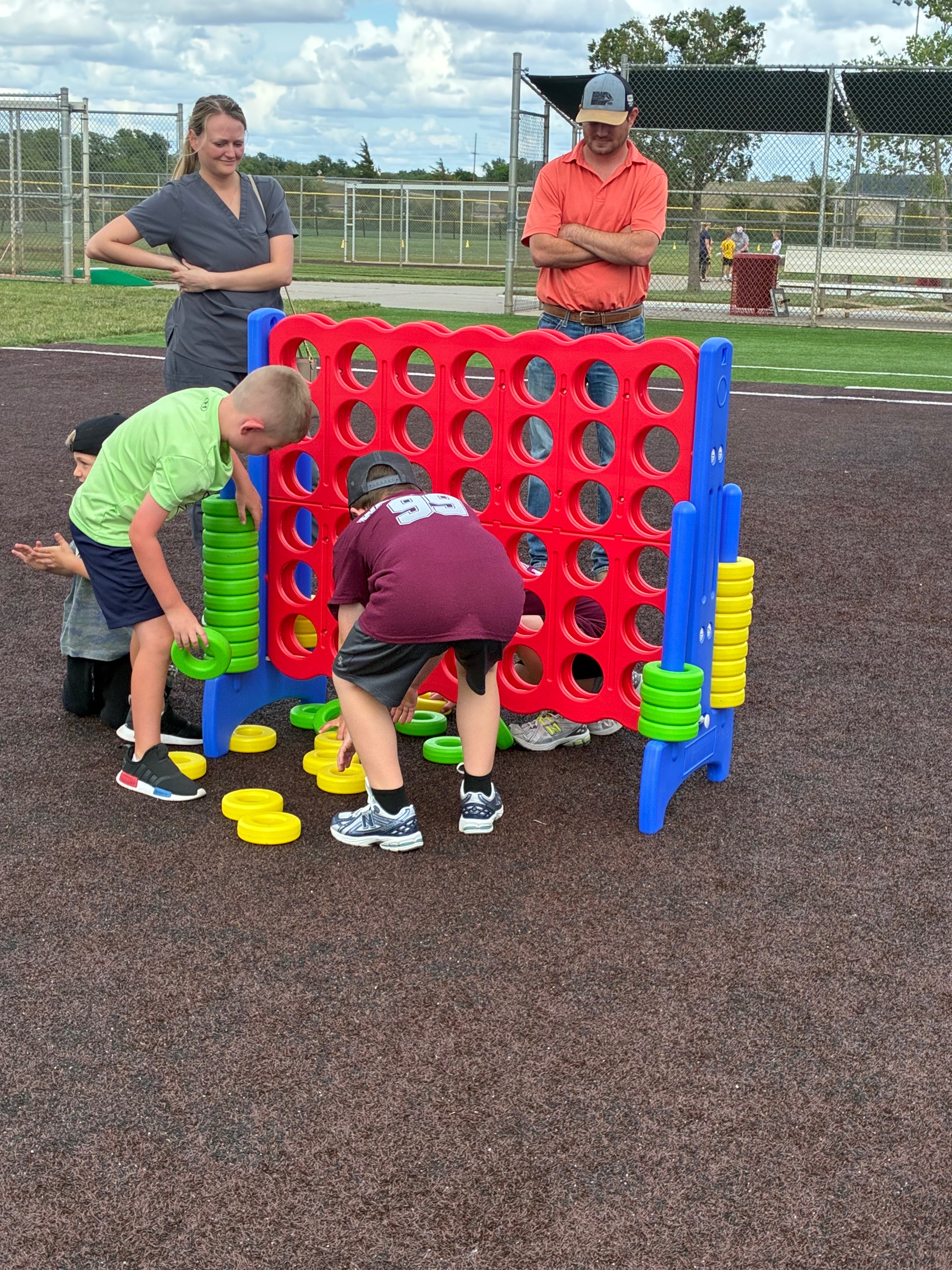 Kids playing Connect 4 during Hays Rec opening day. Photo by Alin Hett/Hays Post. 