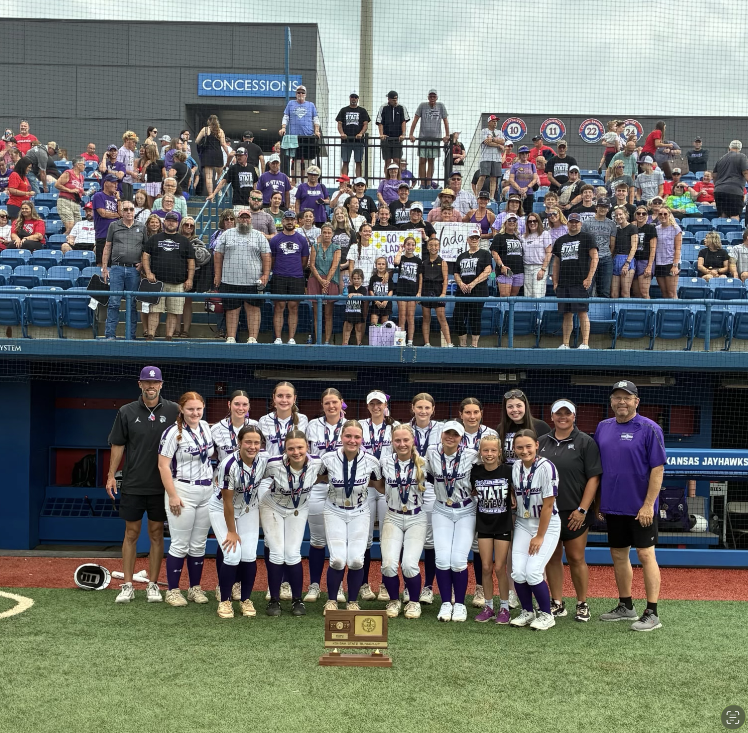 The 2026 Southeast of Saline softball team poses with their second-place trophy following the state final against Silver Lake.