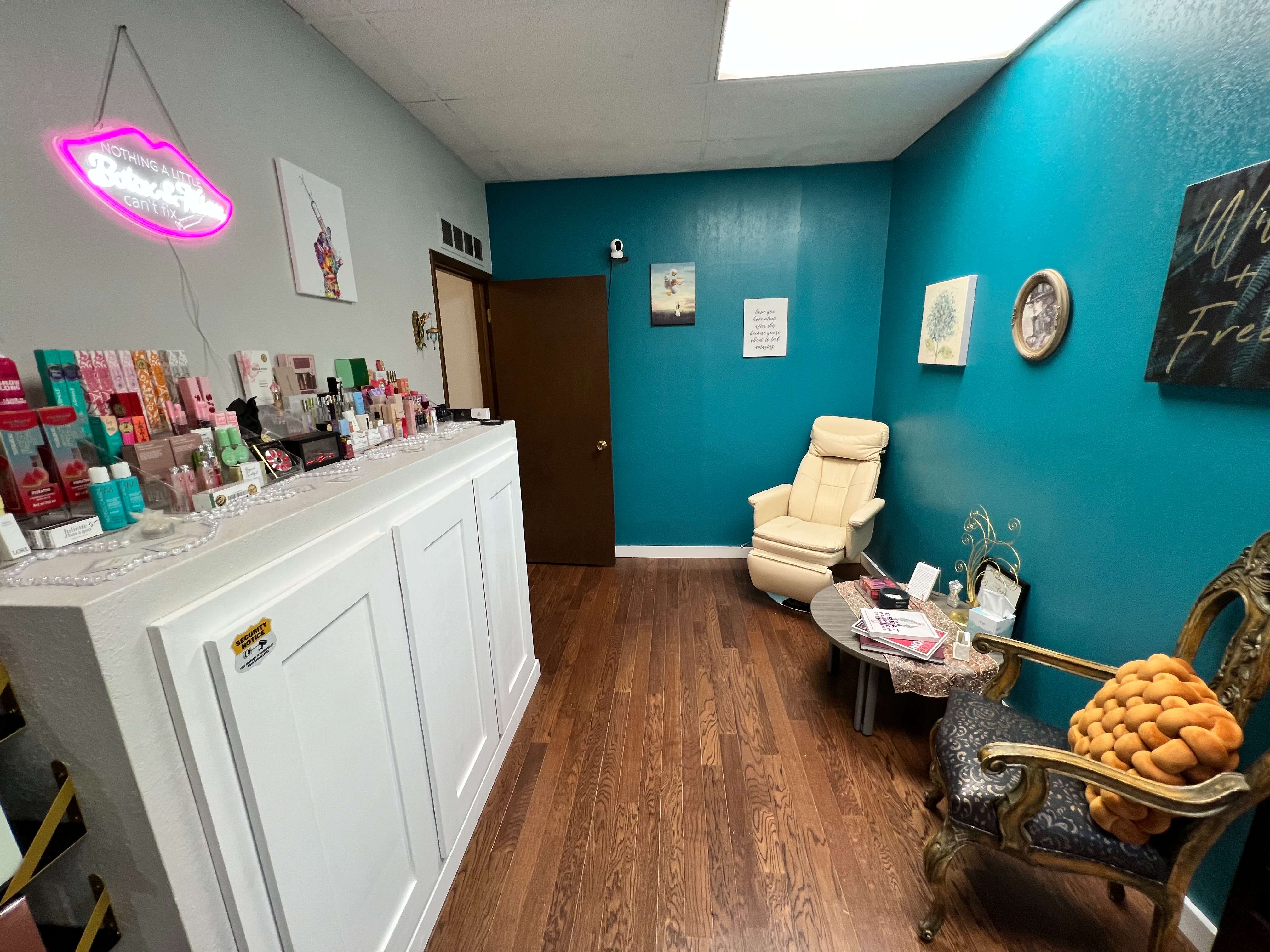 A seating area is shown outside the medical aesthetics treatment room at ARISE Medical & Wellness House during an open house Friday, May 29, 2026, at 1011 N. Main St. in Hutchinson. The clinic offers services including Botox, Juvéderm and chemical peels. (Hutch Post Photo/Sean Boston)