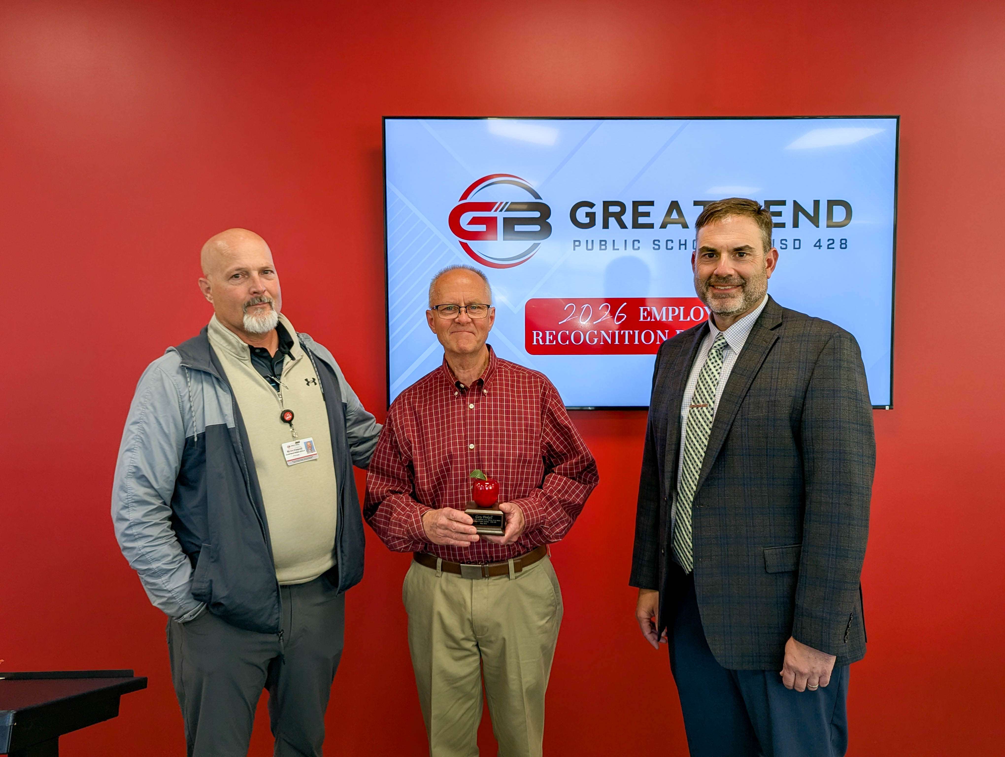 Myron Ellegood, GBMS principal; Gary Pinkall, GBMS teacher; and Khris Thexton, USD 428 superintendent