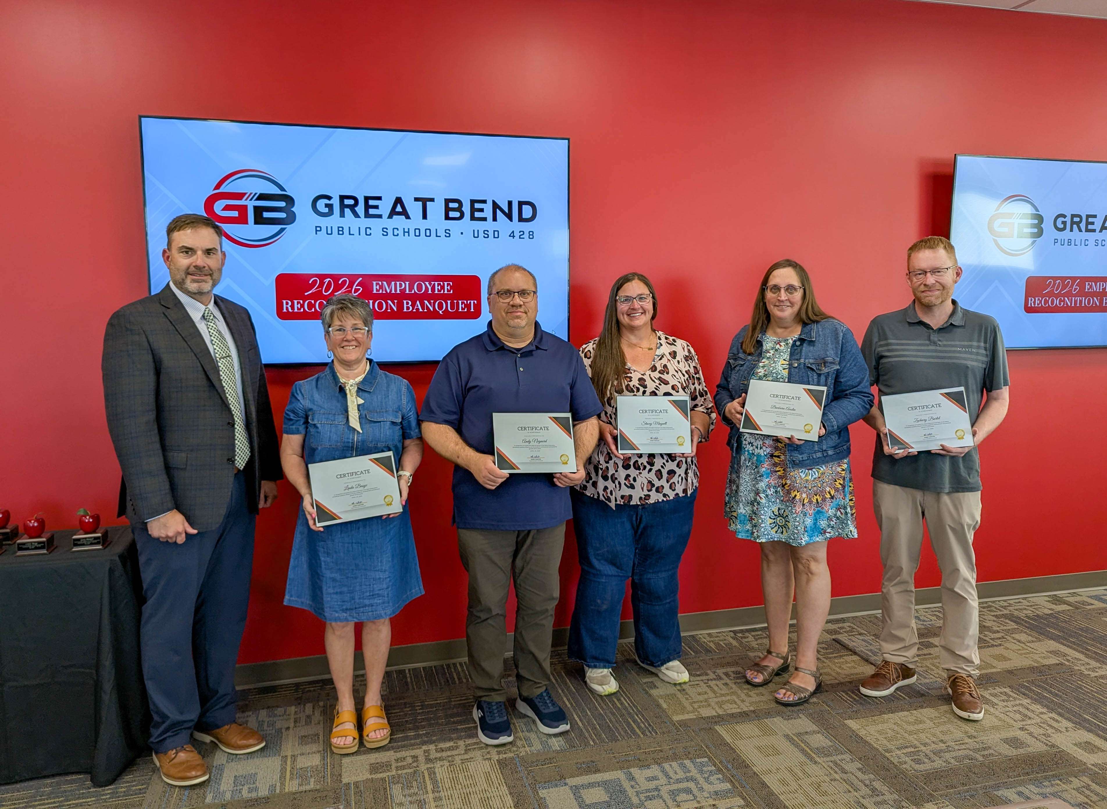 Left to right, Khris Thexton, superintendent of schools, with 25-year teachers, Linda Basye, Andy Negaard, Stacey Magnett, Barbara Austin, and Zachary Bartel. Sarah Irwin was unable to attend.