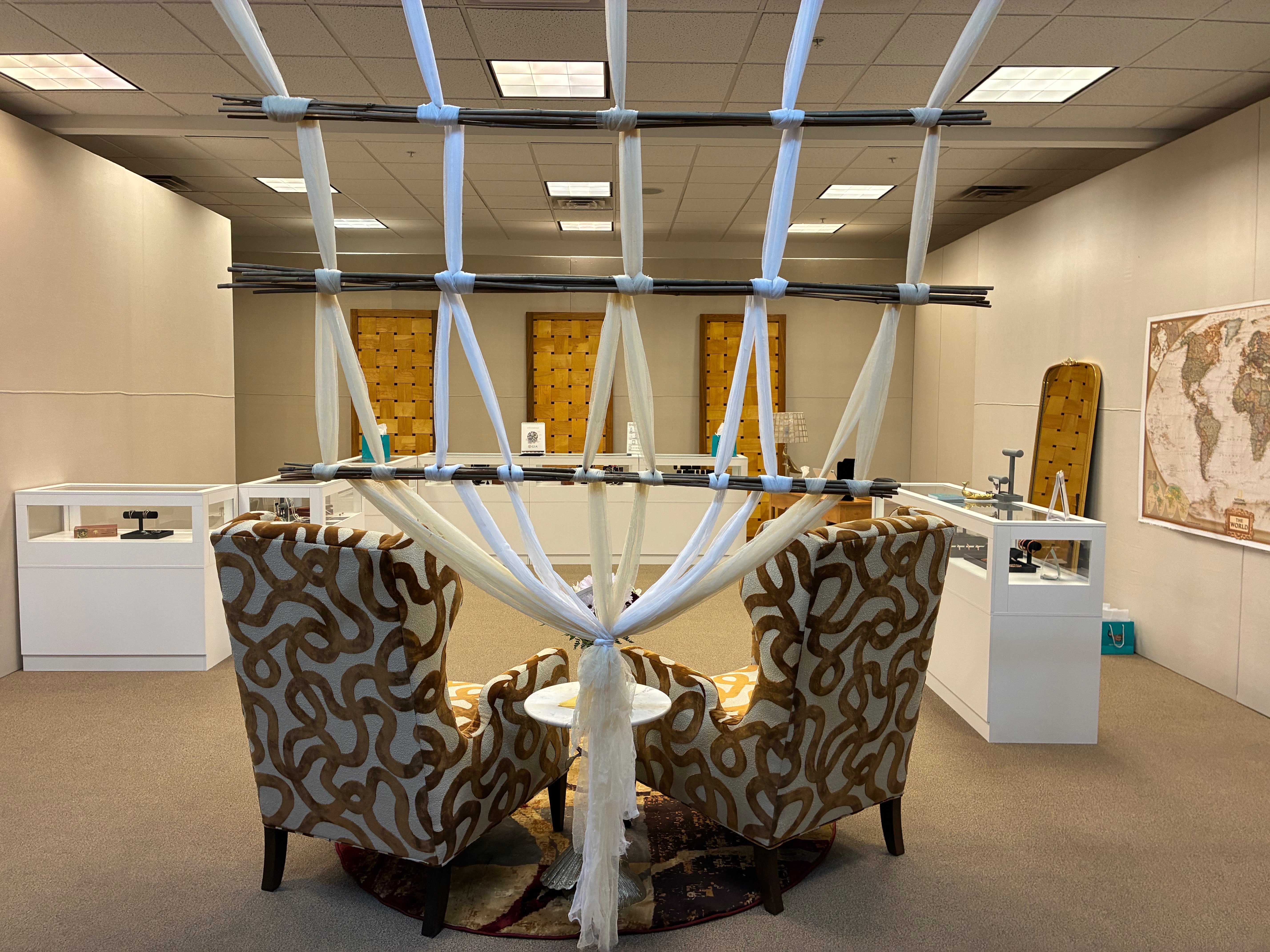 ThyWovenPeacock's elegant ambiance is highlighted in the furniture, jewelry showcases and ceiling décor. Photo by Alin Hett/Hays Post.&nbsp;<br>