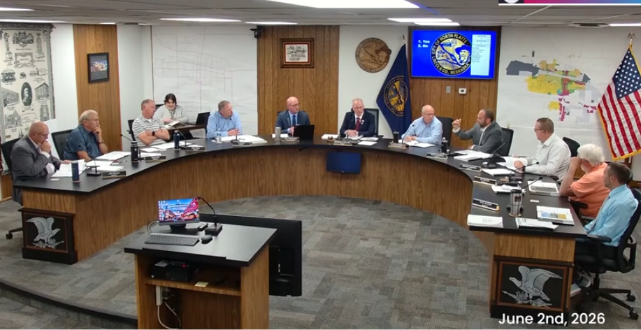 North Platte City Council members discuss how property taxes would be affected under the proposed Newberry Village redevelopment plan during their June 2 meeting. The project's associated tax increment financing request was approved on a 5-3 vote.
