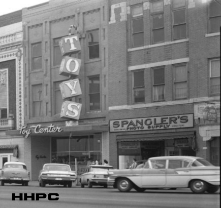 Toy Center - 6 N. Main &amp; Spangler's Photo Supply - 4 N. Main - 1963. Courtesy of the Conard-Harmon Collection.