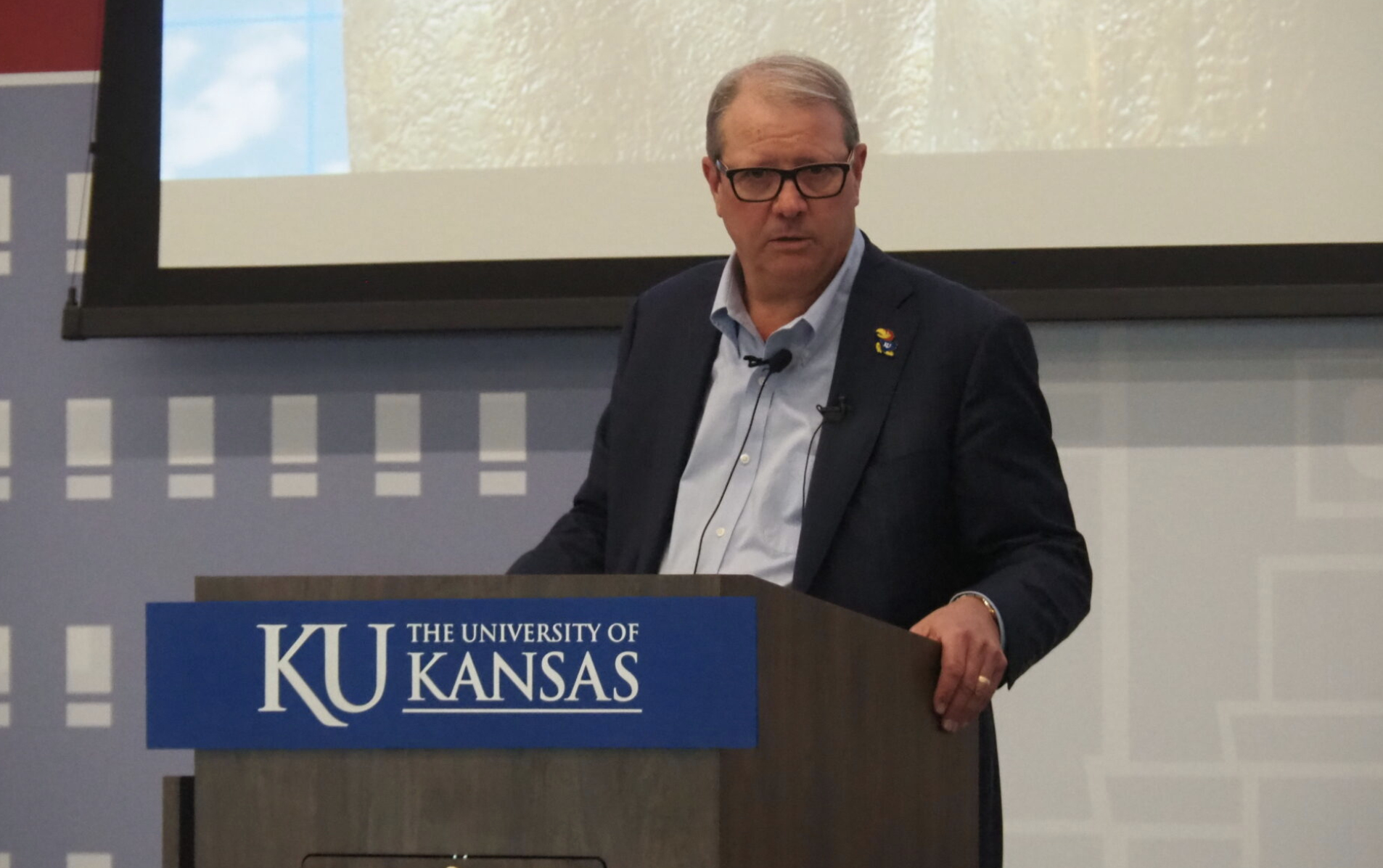  University of Kansas Chancellor Douglas Girod, shown here giving a speech in 2025, is questioning why the National Institutes of Health isn’t paying out research dollars already awarded by Congress. (Photo by Tim Carpenter/Kansas Reflector)