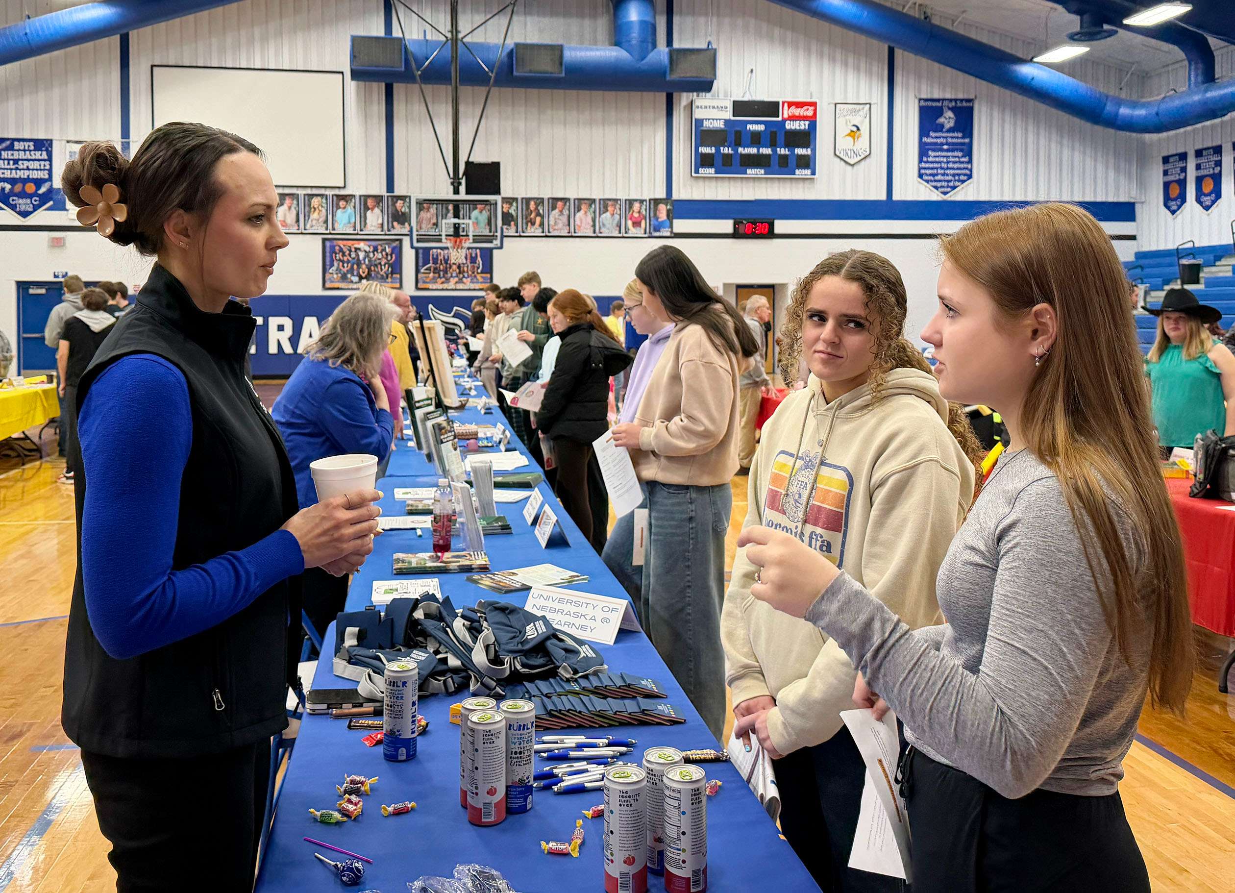 Mandy Sand meets with students during a career fair at Bertrand Community School, which partners with UNK through the Grow the Good Life program. (UNK College of Business and Technology)