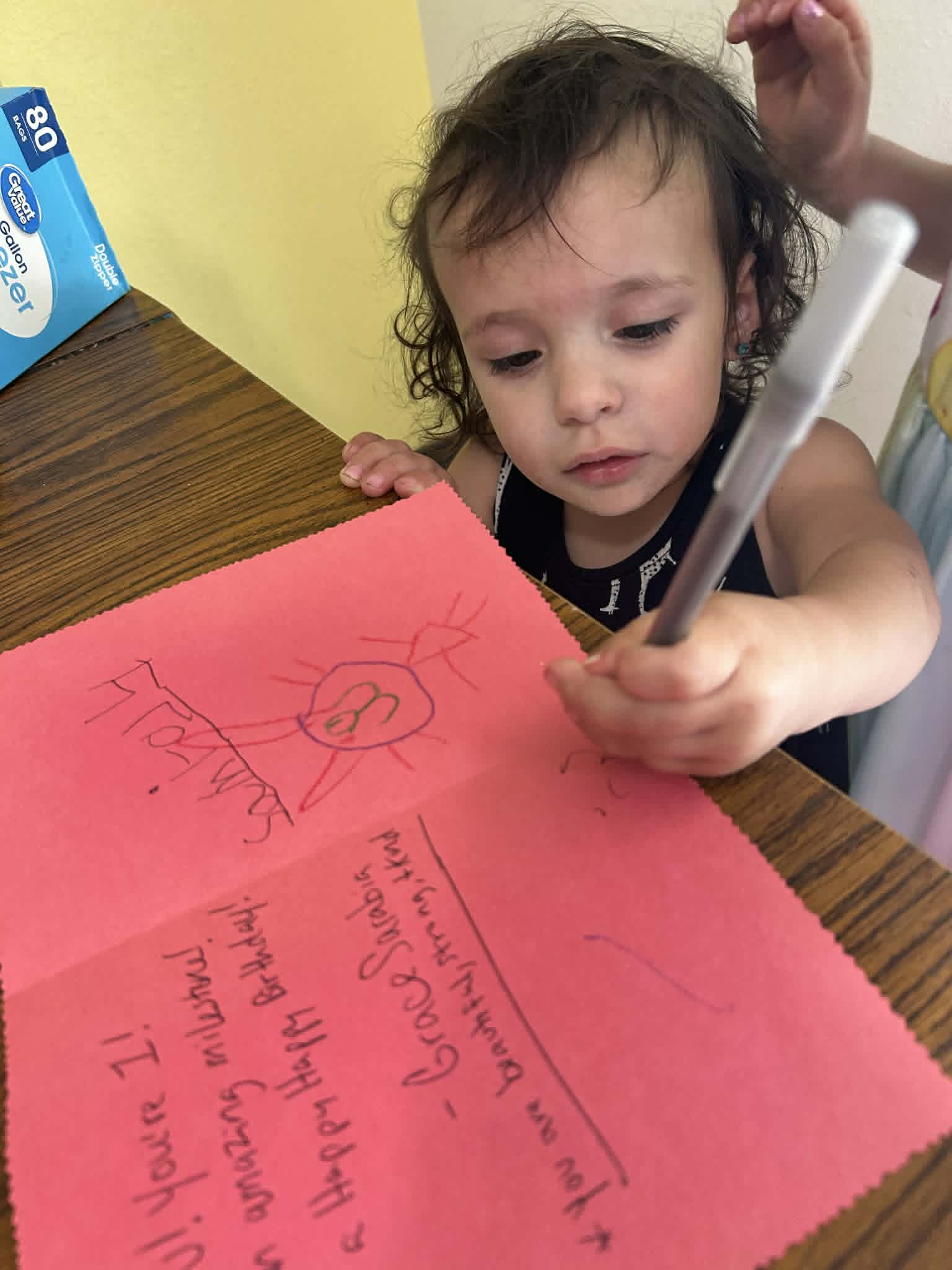 Grace Sarabia's children are an active part of her initiative. Creating cards for the kids who are celebrating birthdays with one of her cakes. (Grace Sarabia)