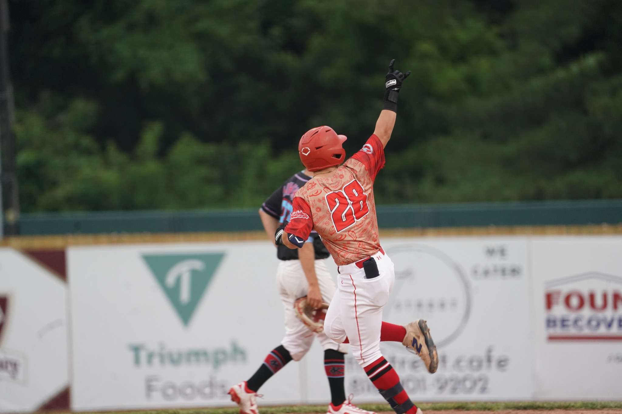 Atchison alum Boston Bruce rounds the bases and celebrates after hitting his solo home run in a 9-1 win over the Kansas City Monarchs/ Photo courtesy of the St. Joseph Mustangs Facebook page