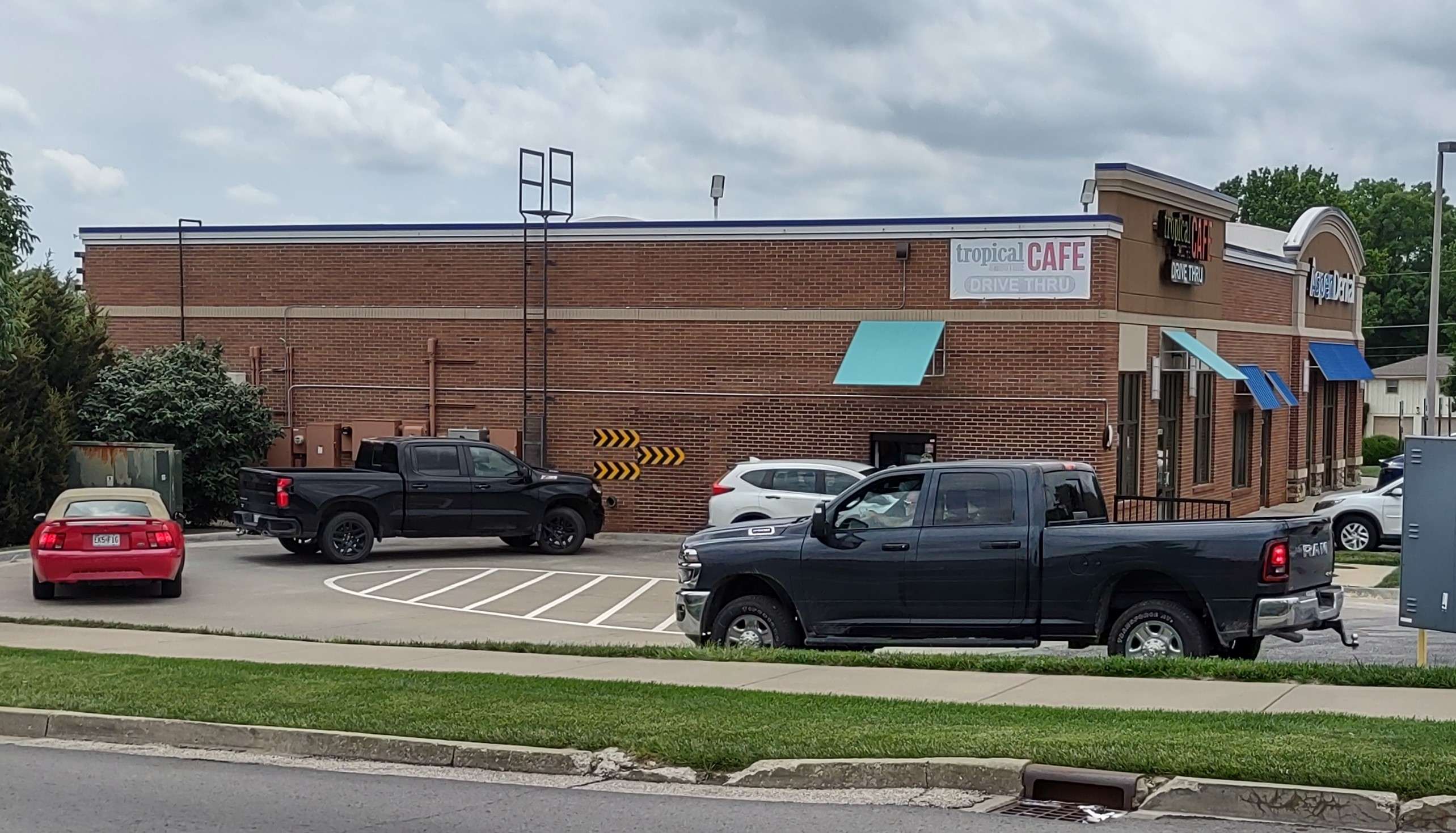 Patrons lined up outside Tropical Smoothie Cafe.