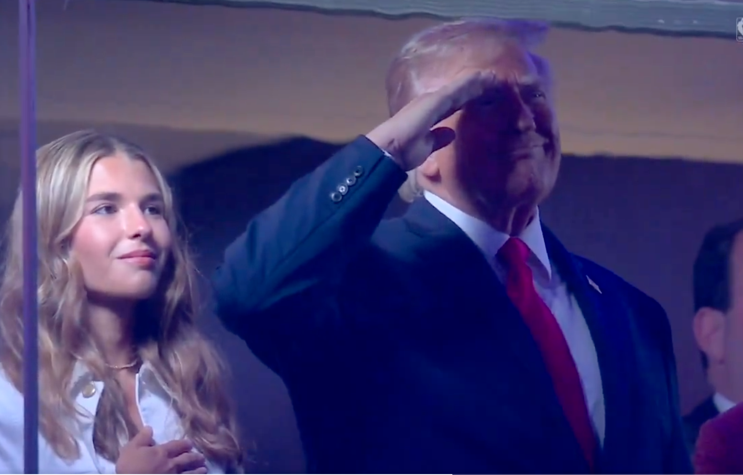 President Trump and his grandaughter during the National Anthem before game 3 of the NBA finals-image from White House video