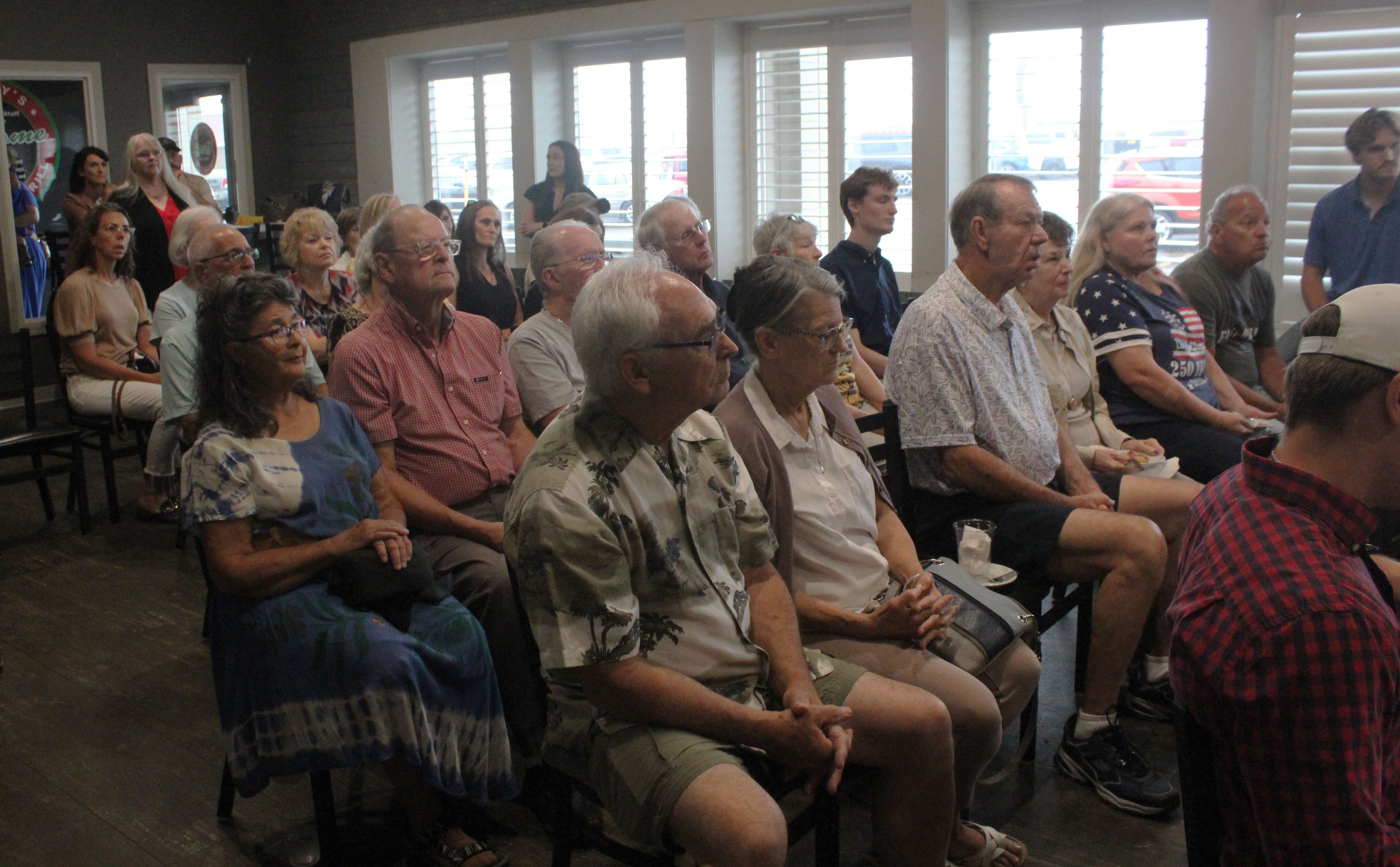 A crowd gathered at Thirsty's in Hays to hear from Republican gubernatorial candidate Philip Sarnecki. Photo by Cristina Janney/Hays Post