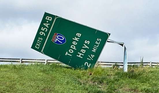 One of the directional signs on I-135 in Saline County was damaged by high winds the evening of June 8. Photo by Kansas Department of Transportation 