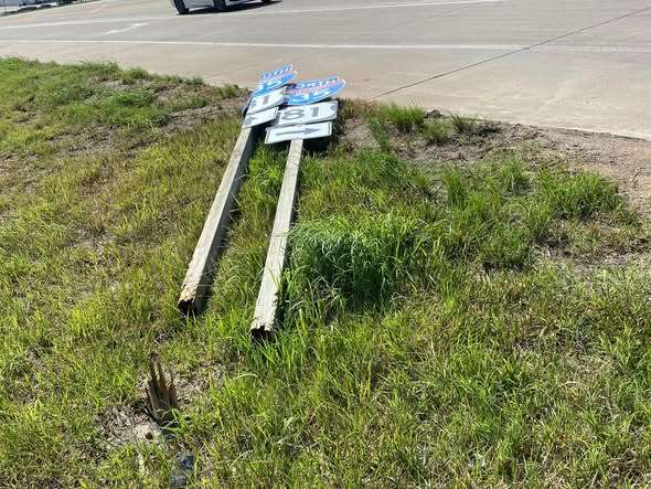 Broken directional traffic signs damaged Monday night. Photo by Kansas Department of Transportation
