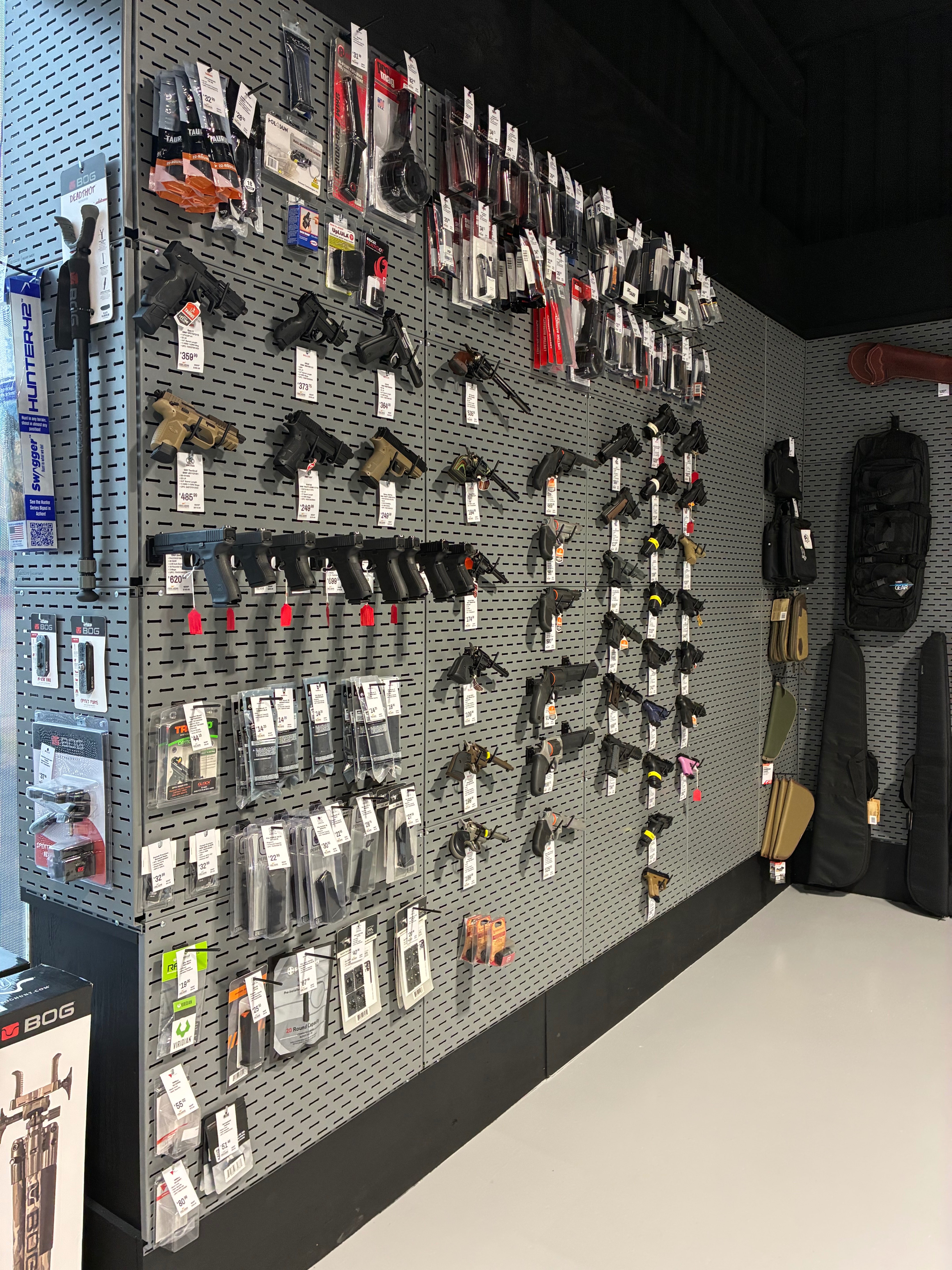 A selection of Taurus Judge revolvers, 9mm handguns, magnum revolvers, firearm accessories and carrying bags is displayed at FASARMS' new location. Photo by Alin Hett/Hays Post. <br>