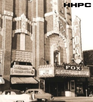 Karmelkorn Shop - Fox Theatre - 18 E. 1st with Adrian's Record Shop - 16 E. 1st - 1954. Courtesy of the Conard-Harmon Collection.