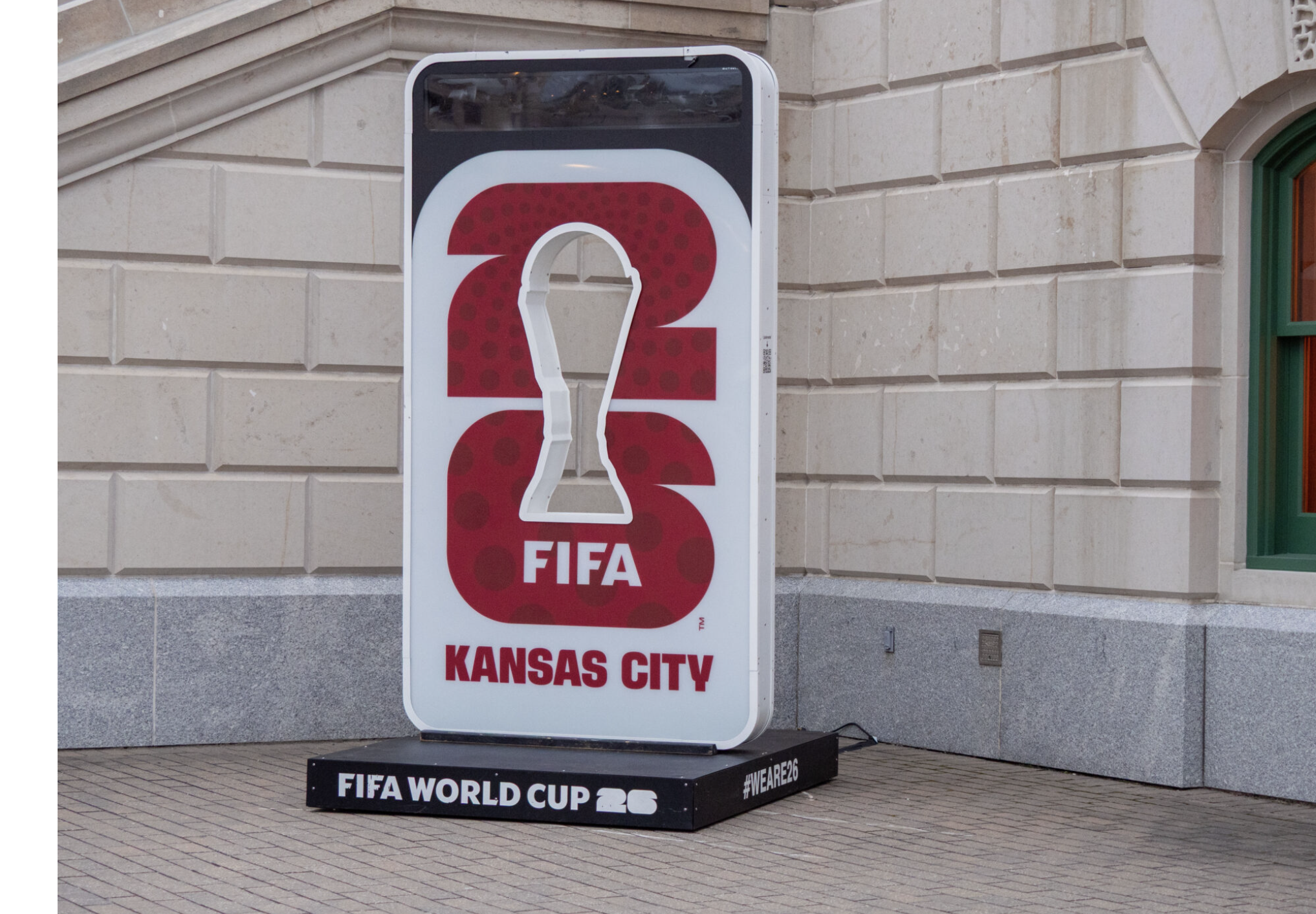 Kansas City is the smallest host city for the North American 2026 FIFA World Cup. A promotional sign appears on Jan. 13, 2026, outside the Kansas Statehouse in Topeka. (Photo by Sherman Smith/Kansas Reflector)