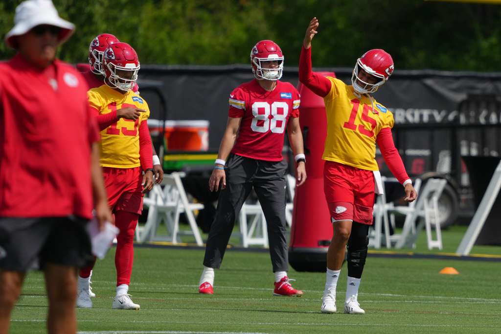 Kansas City Chiefs quarterback Patrick Mahomes (15) signals teammates during the NFL football team's practice Wednesday, June 10, 2026, in Kansas City, Mo. (AP Photo/Ed Zurga)