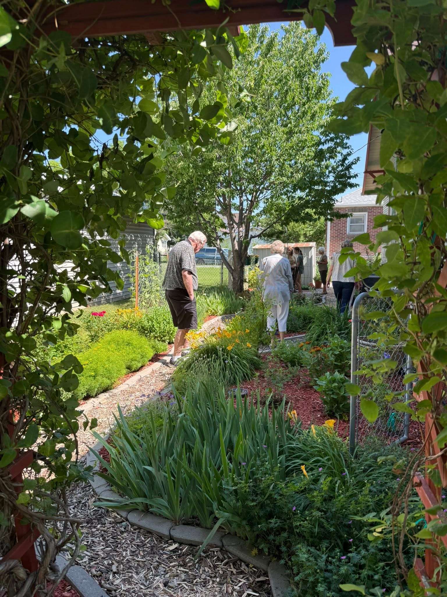 Visitors explore one of the featured gardens during the 2025 Landscape and Garden Tour, a self-guided event that showcases unique outdoor spaces across North Platte while raising funds for Deborah’s Legacy. (Deborah's Legacy)