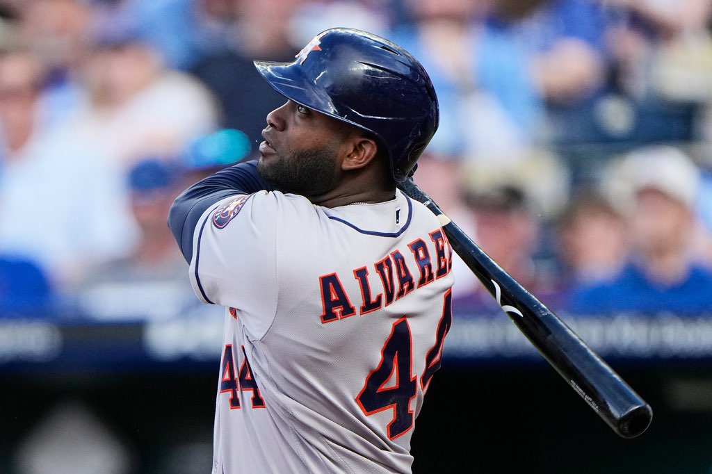 Houston Astros' Yordan Alvarez watches his grand slam during the first inning of a baseball game against the Kansas City Royals, Friday, June 12, 2026, in Kansas City, Mo. (AP Photo/Charlie Riedel)